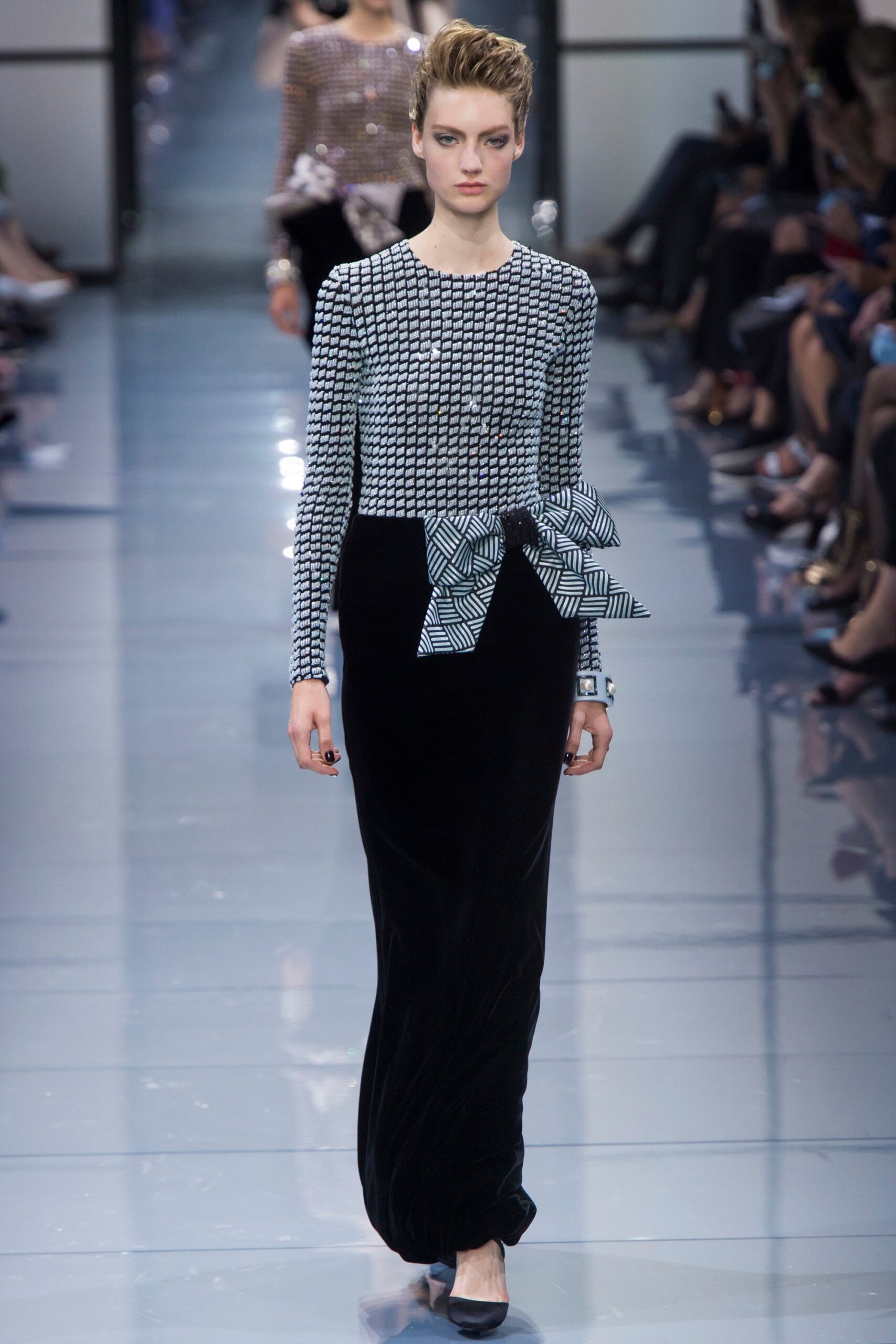 black velvet gown with white embellishments