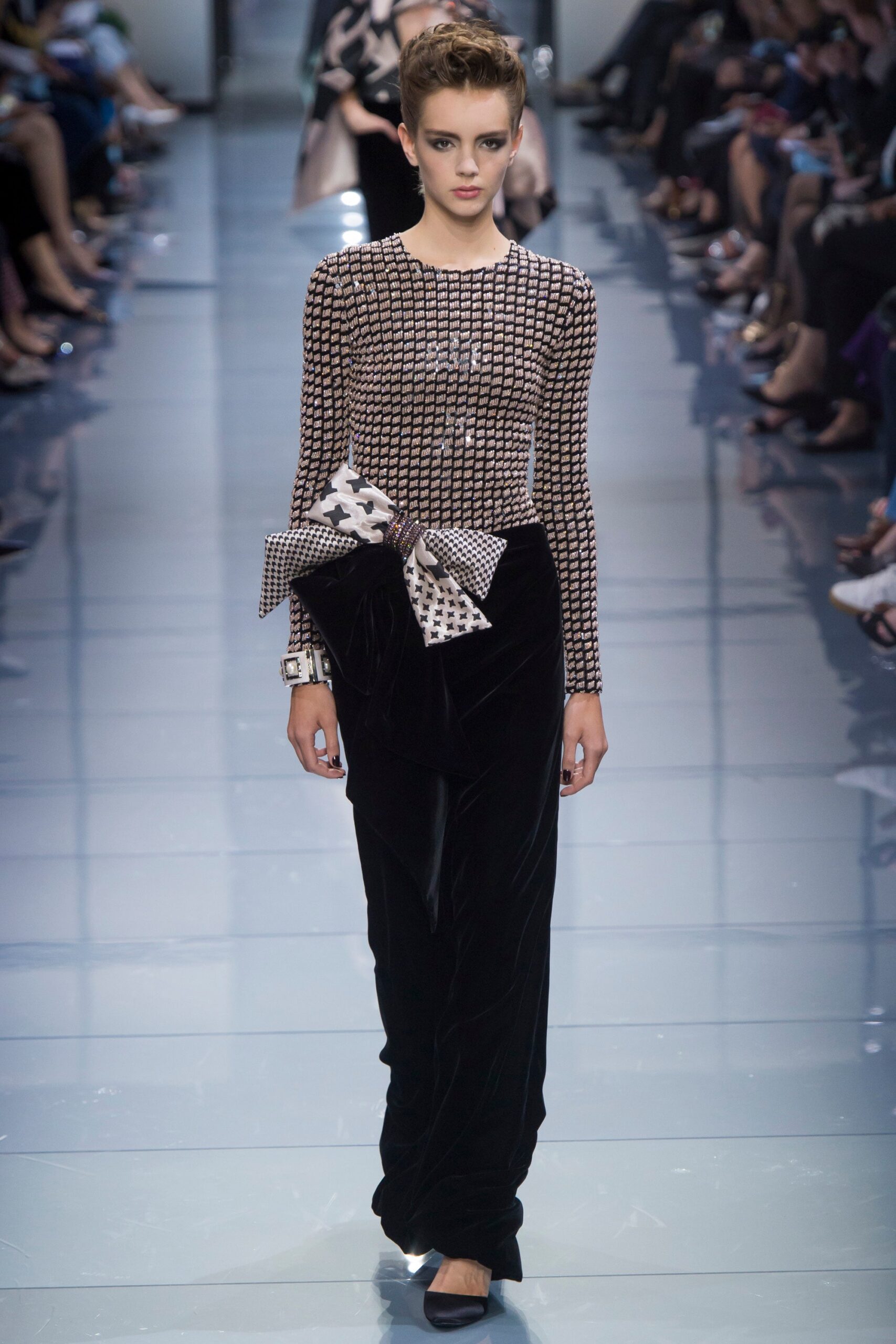 fitted black and white top with velvet pants