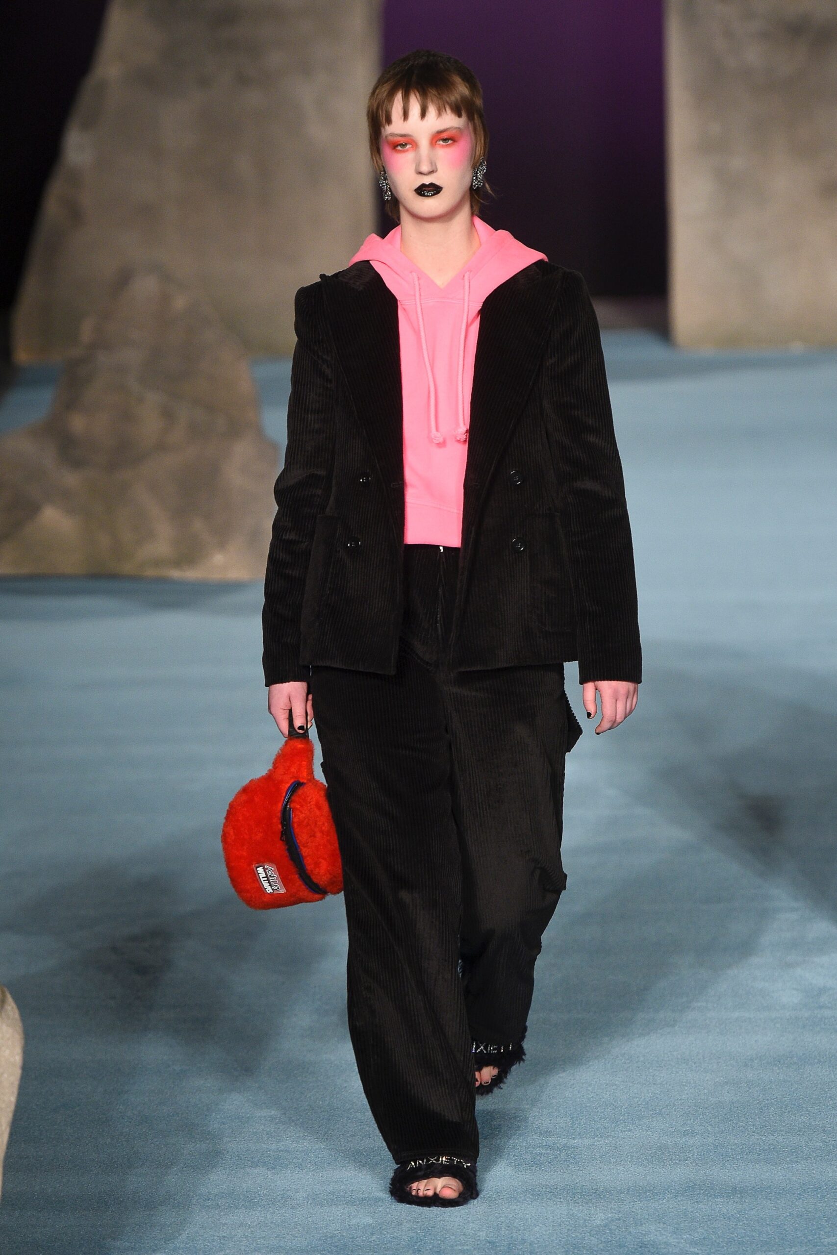 black relaxed jacket with pink hoodie