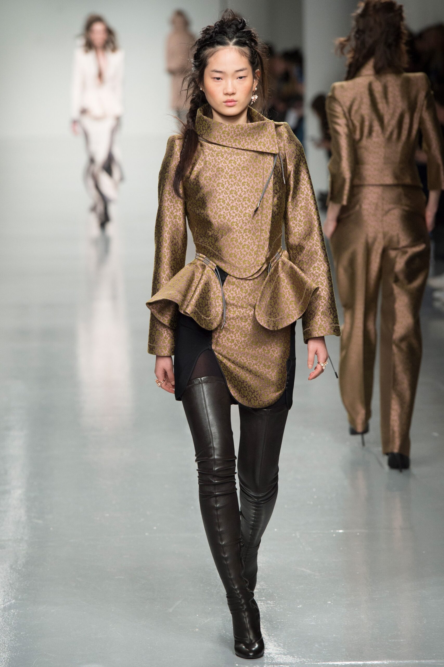 gold silk fitted top with black leather pants