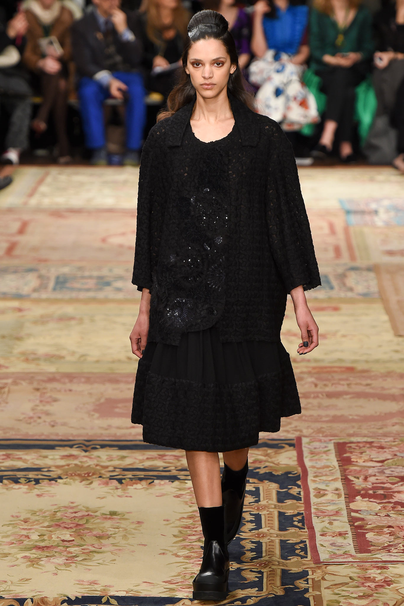 black tiered dress with jacket