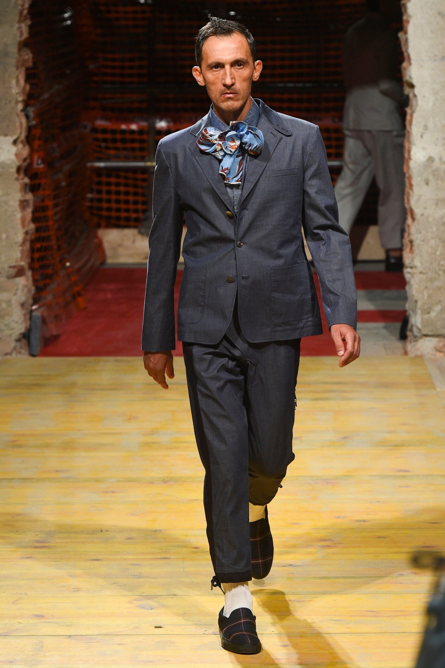 blue tailored suit with scarf