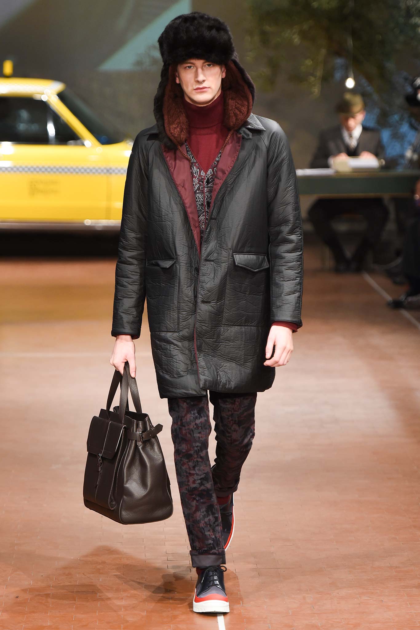black coat red sweater outfit