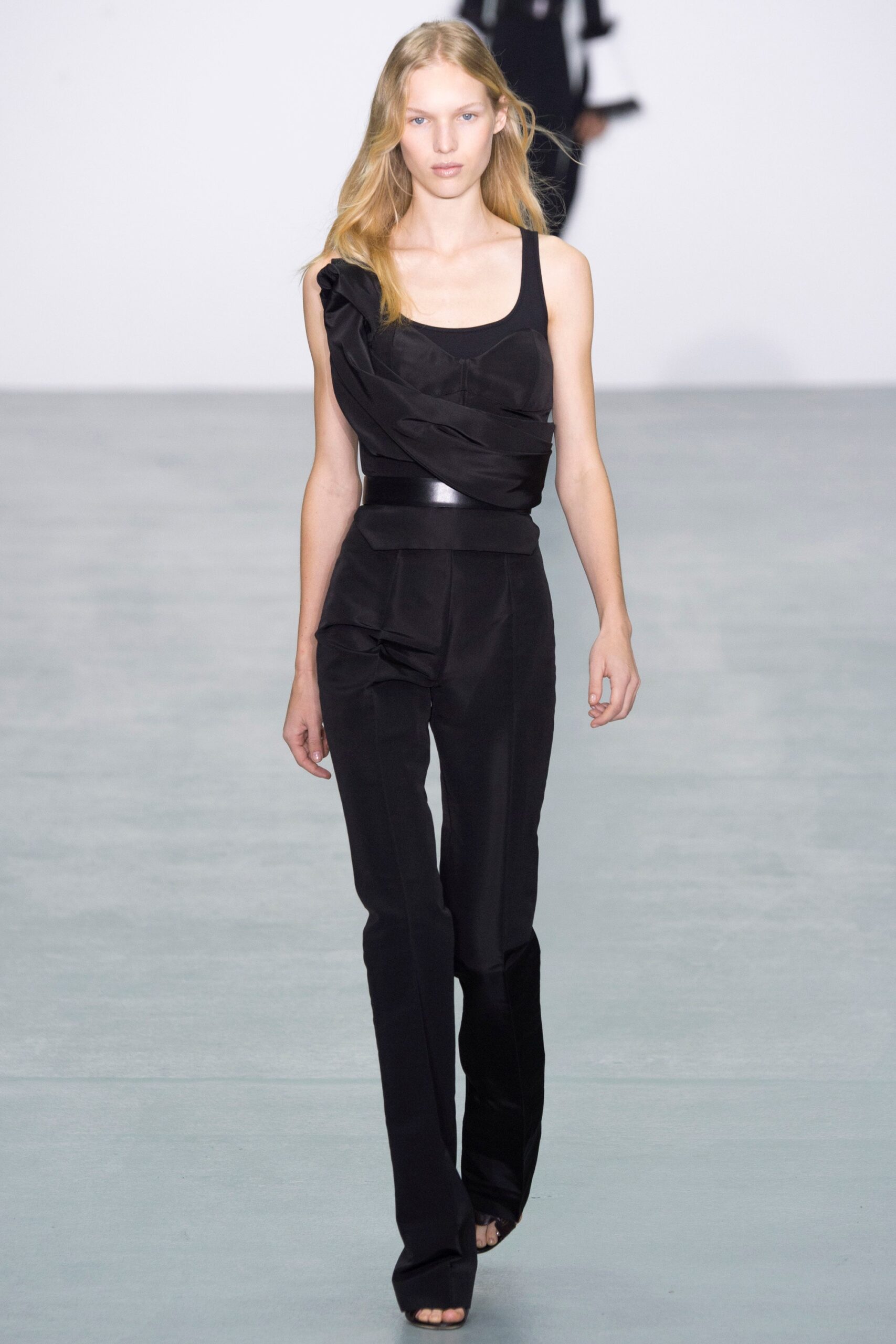 black fitted silk top and pants
