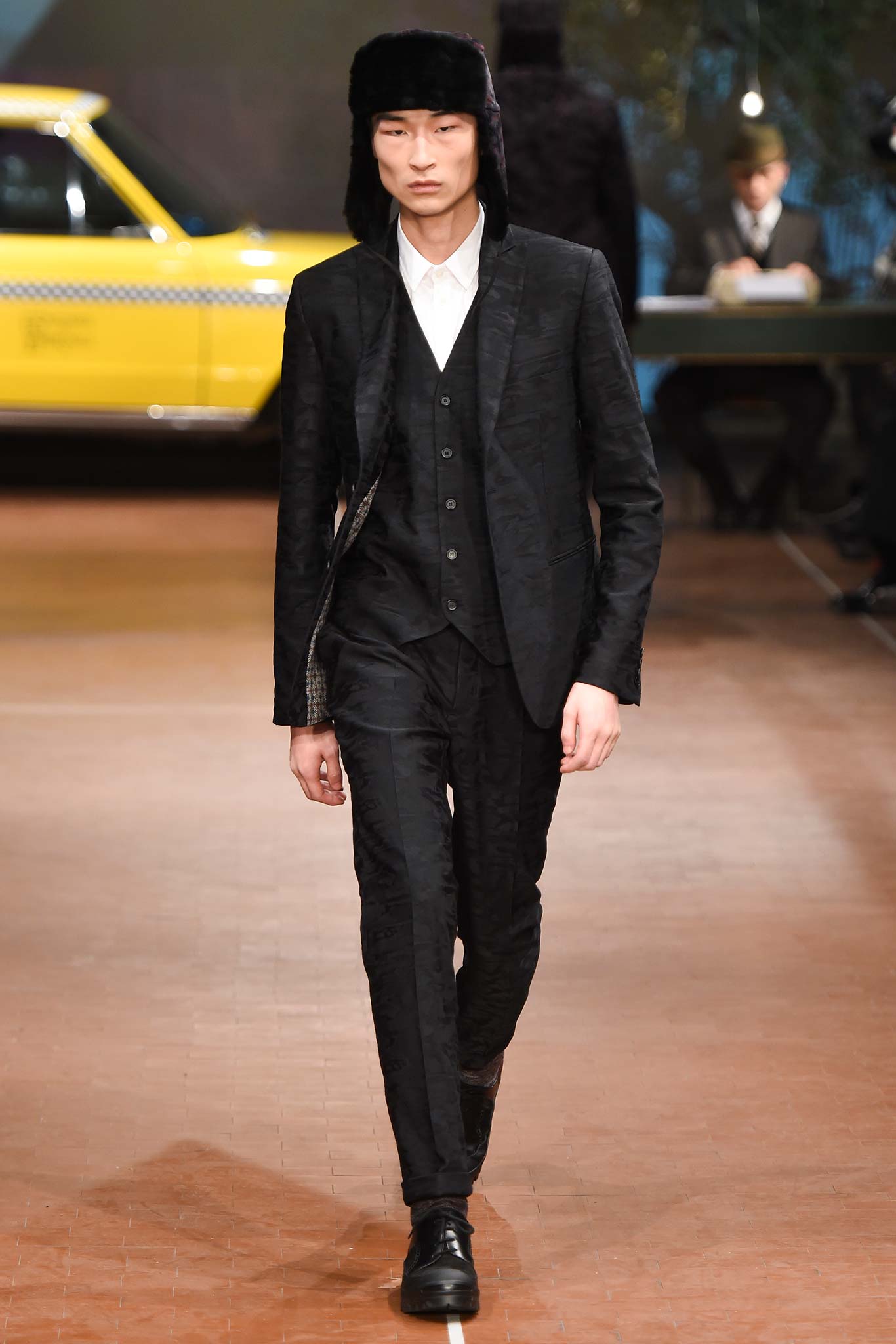 black tailored suit with white shirt