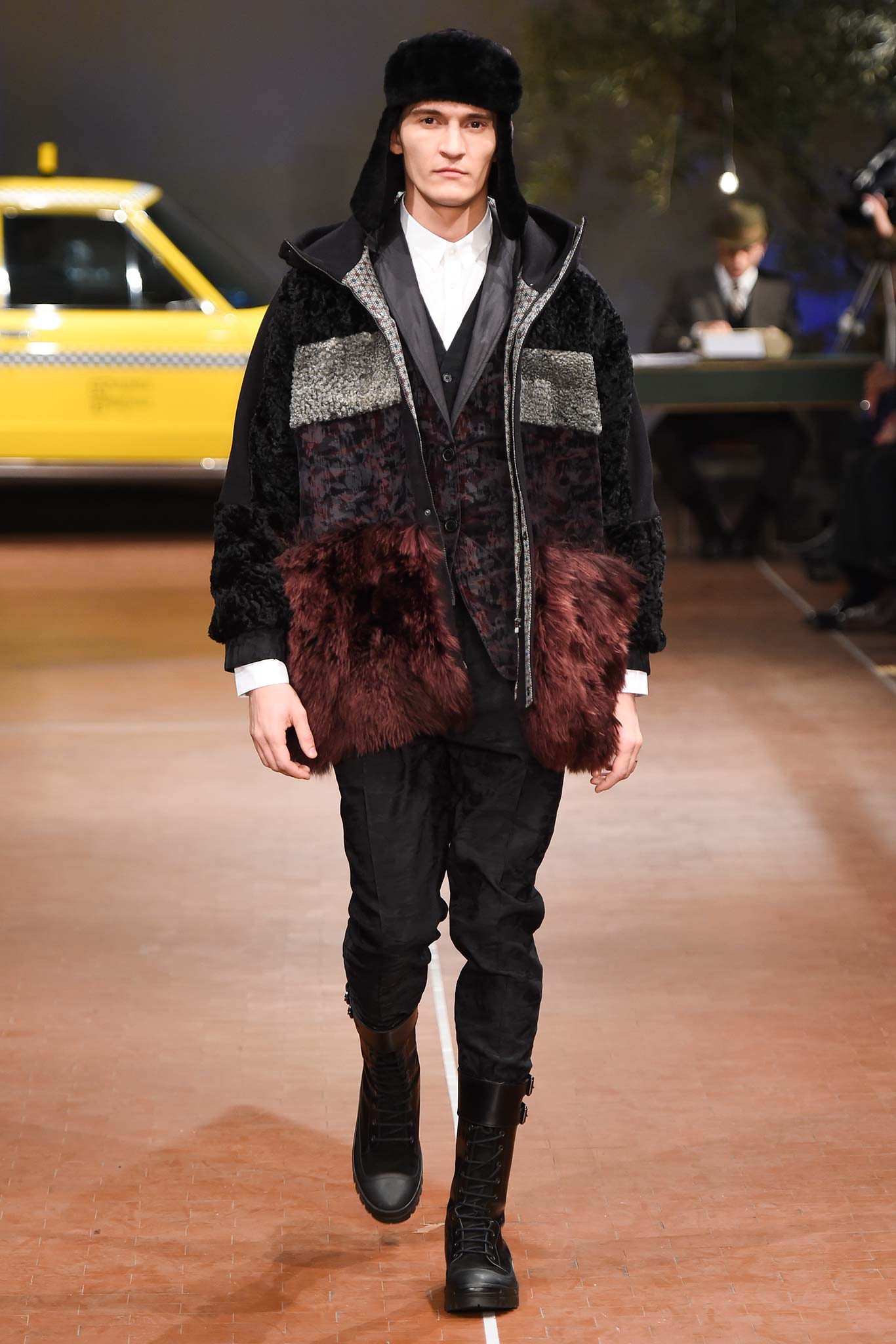 relaxed black fur jacket with fitted pants