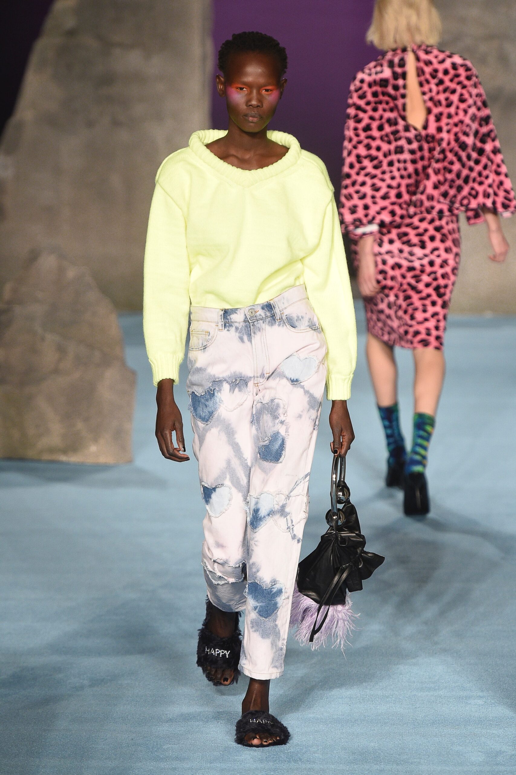 neon yellow hoodie with distressed pants