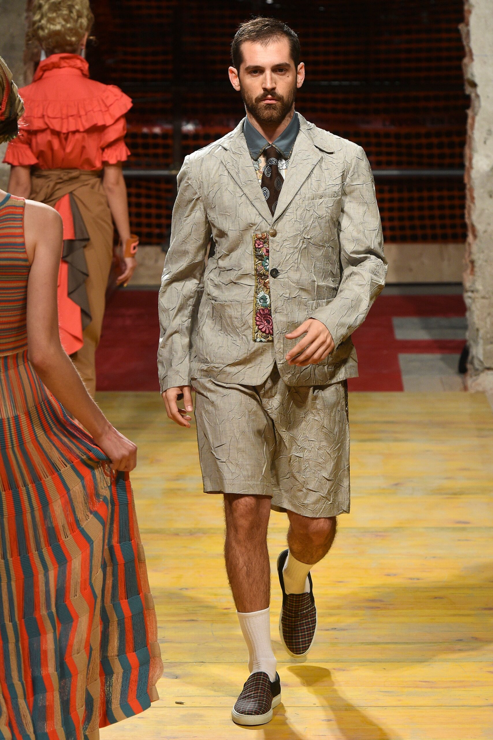 beige tailored suit with shorts