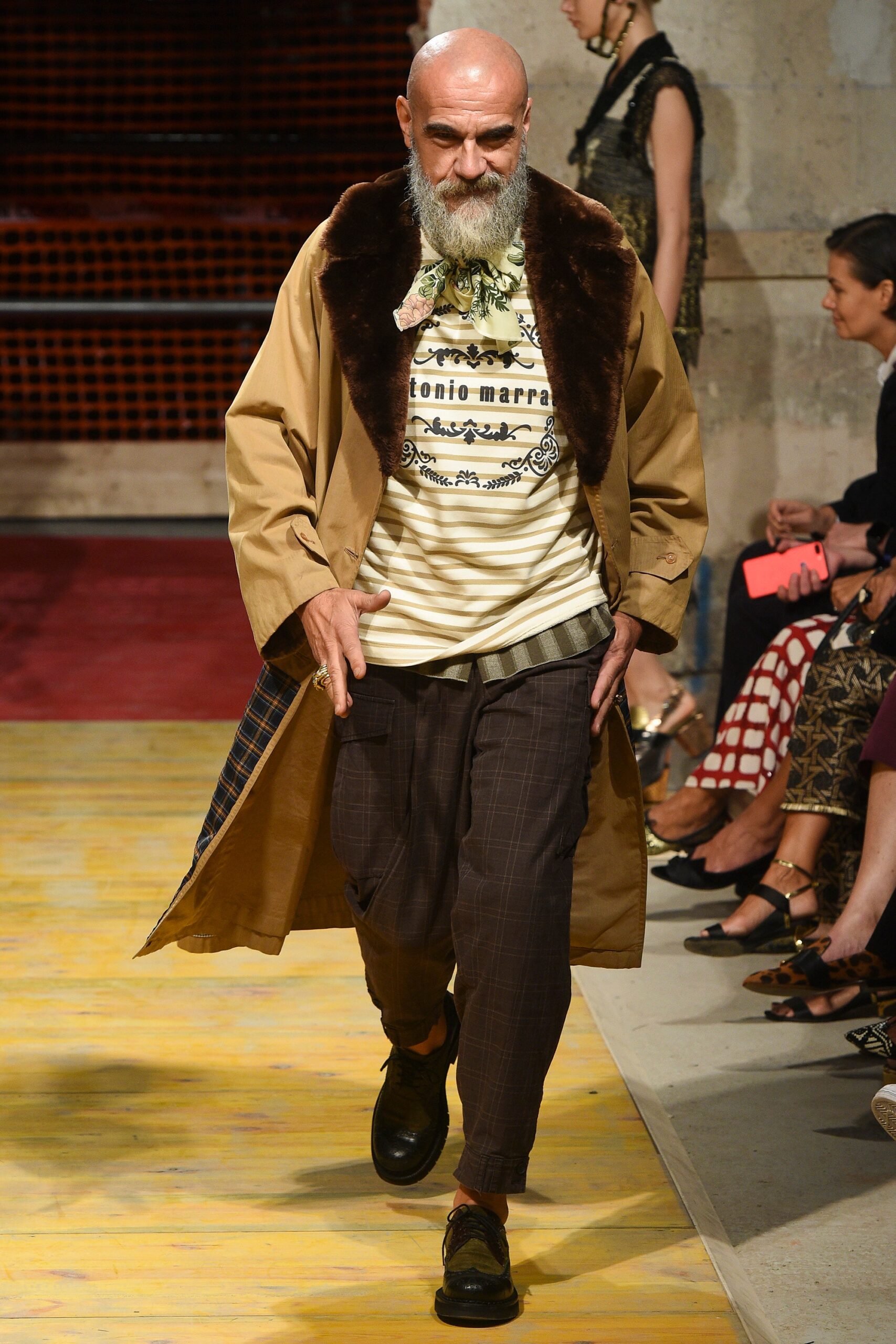 beige coat with printed t-shirt