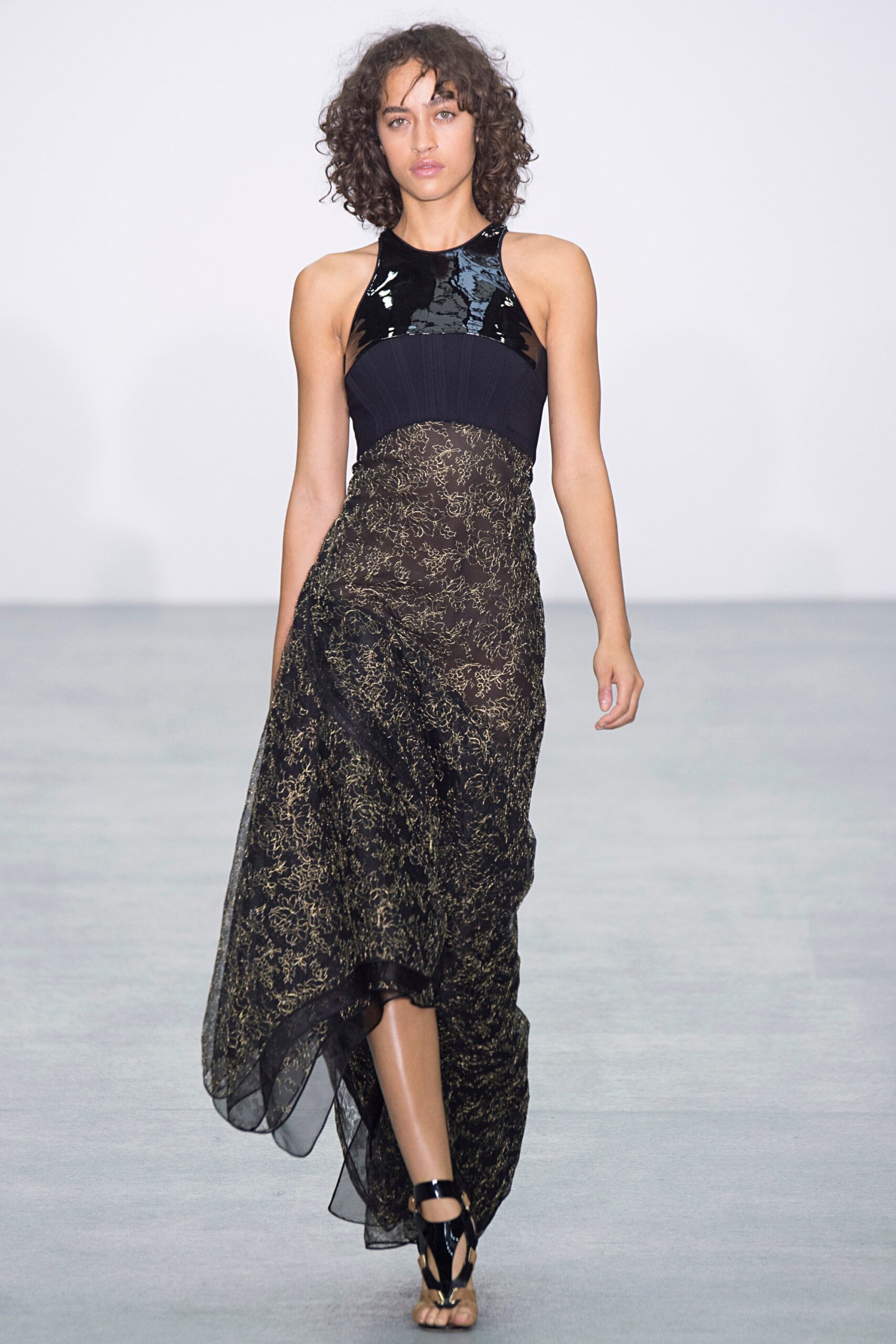 black and gold flowing maxi dress