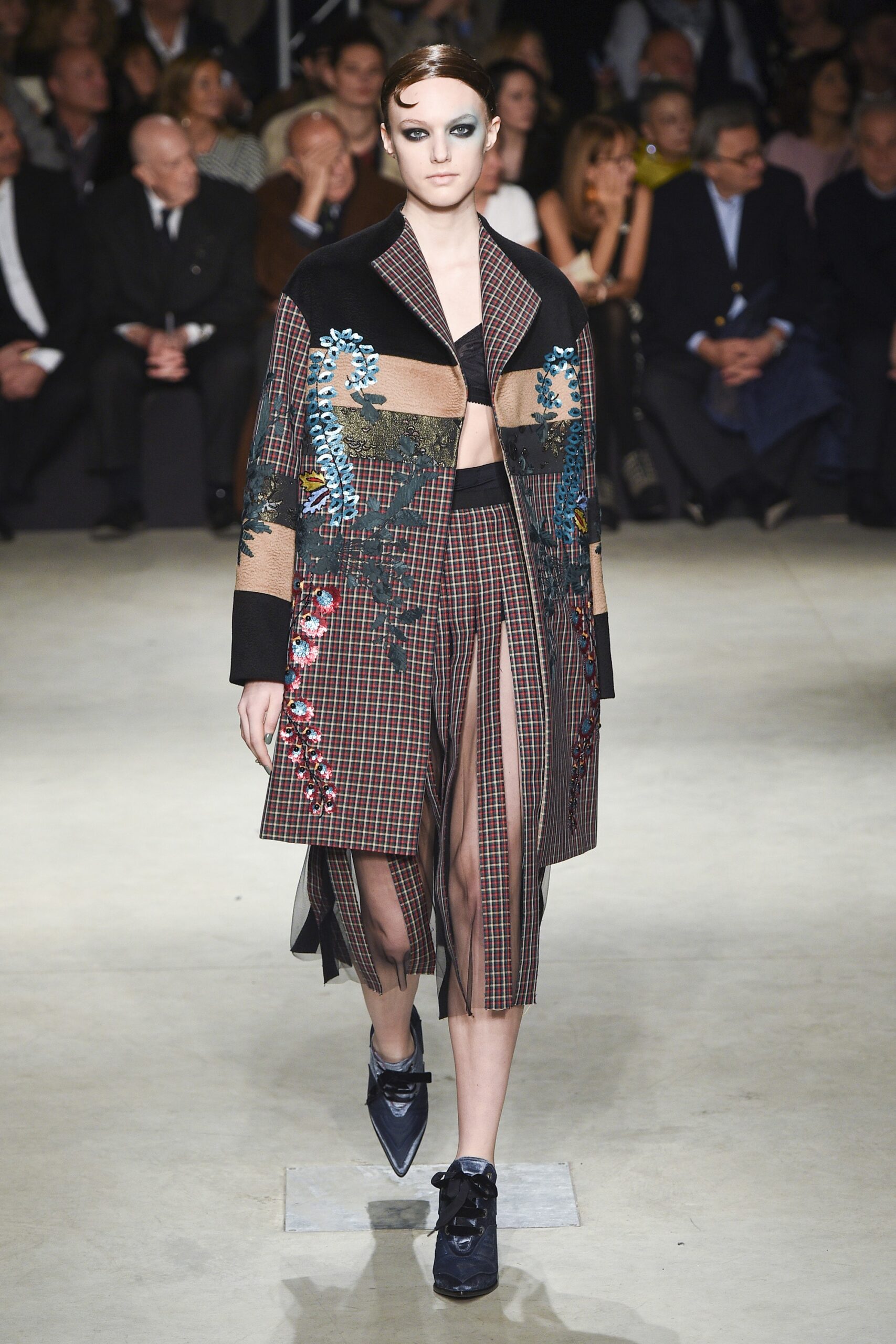 embroidered brown coat with black top