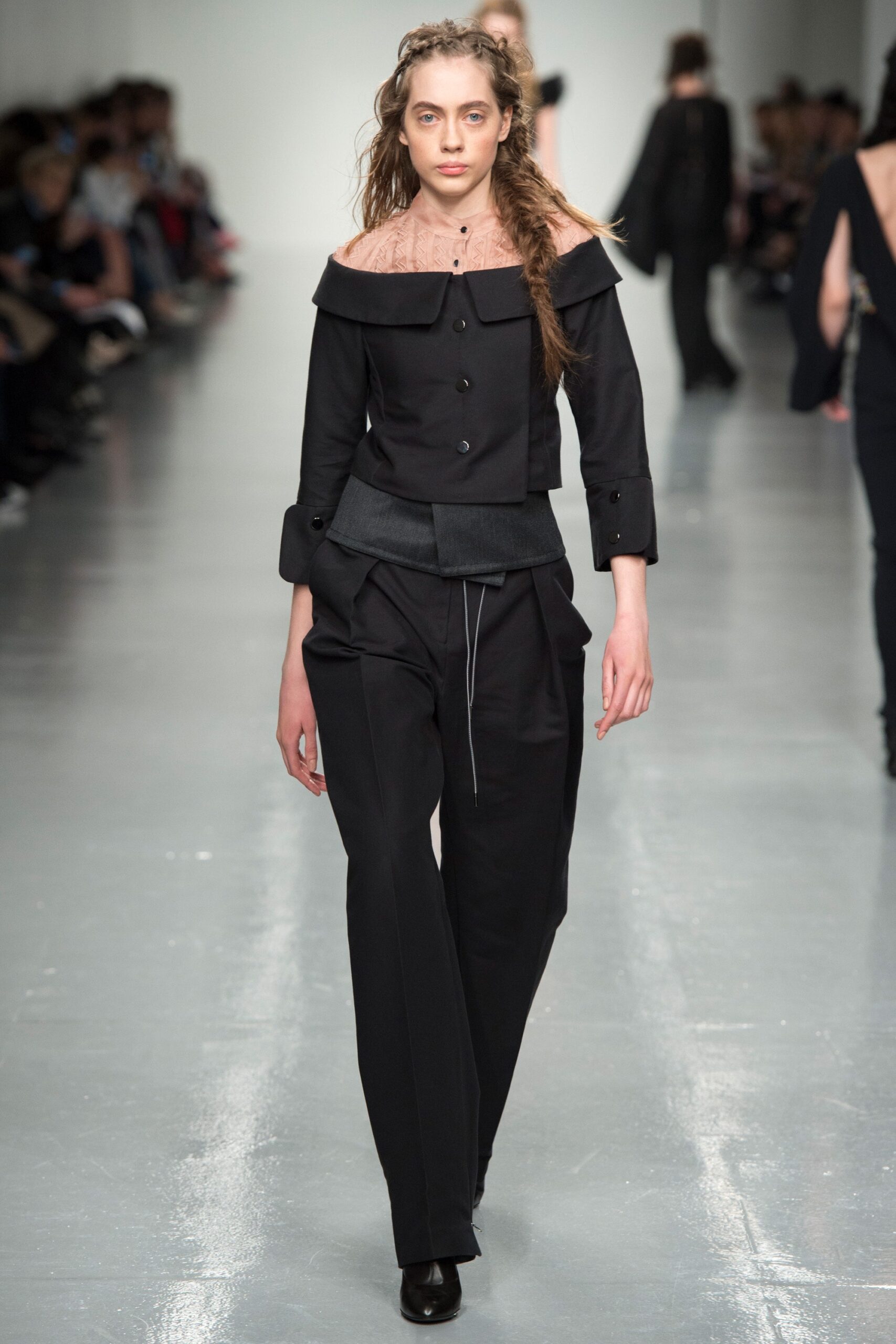 black fitted jacket and relaxed pants