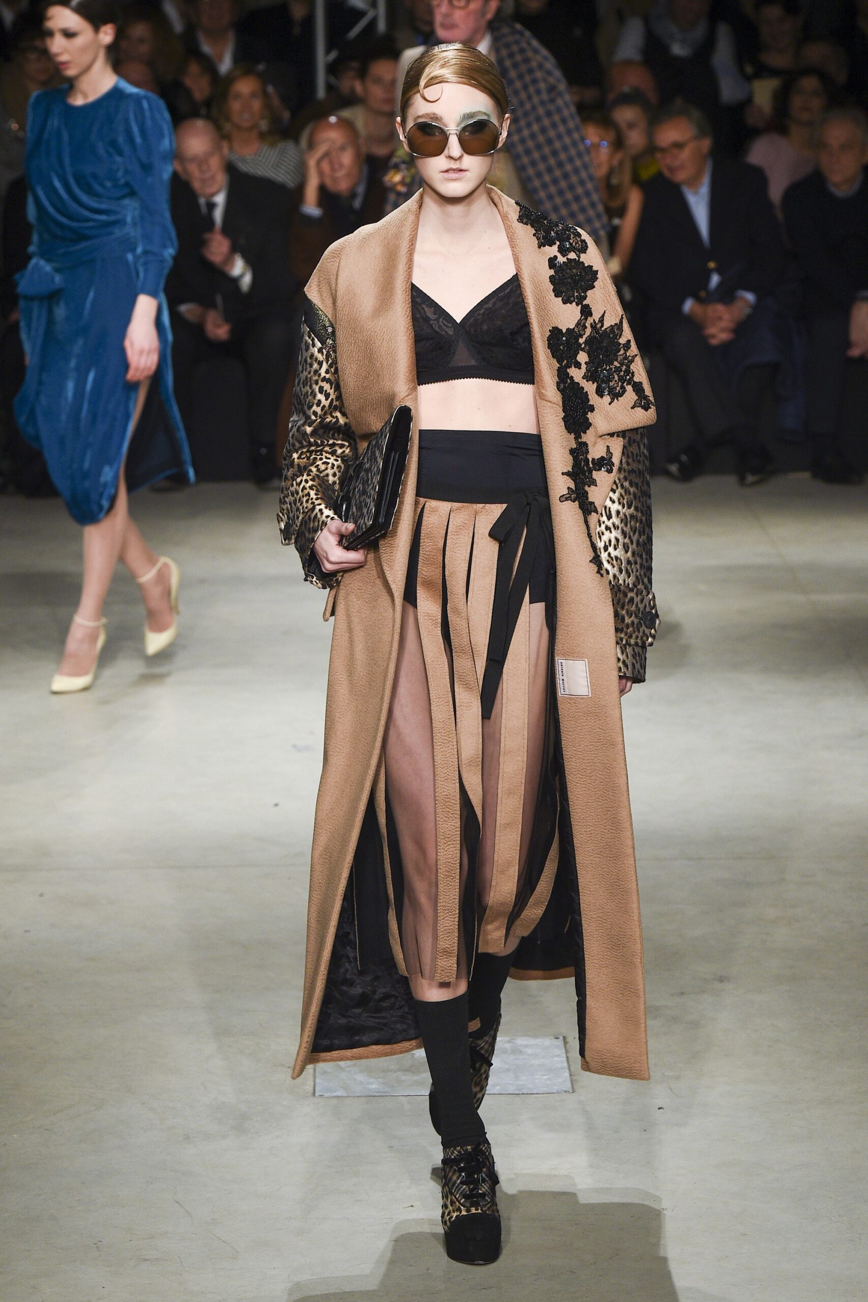 beige relaxed coat with pleated skirt