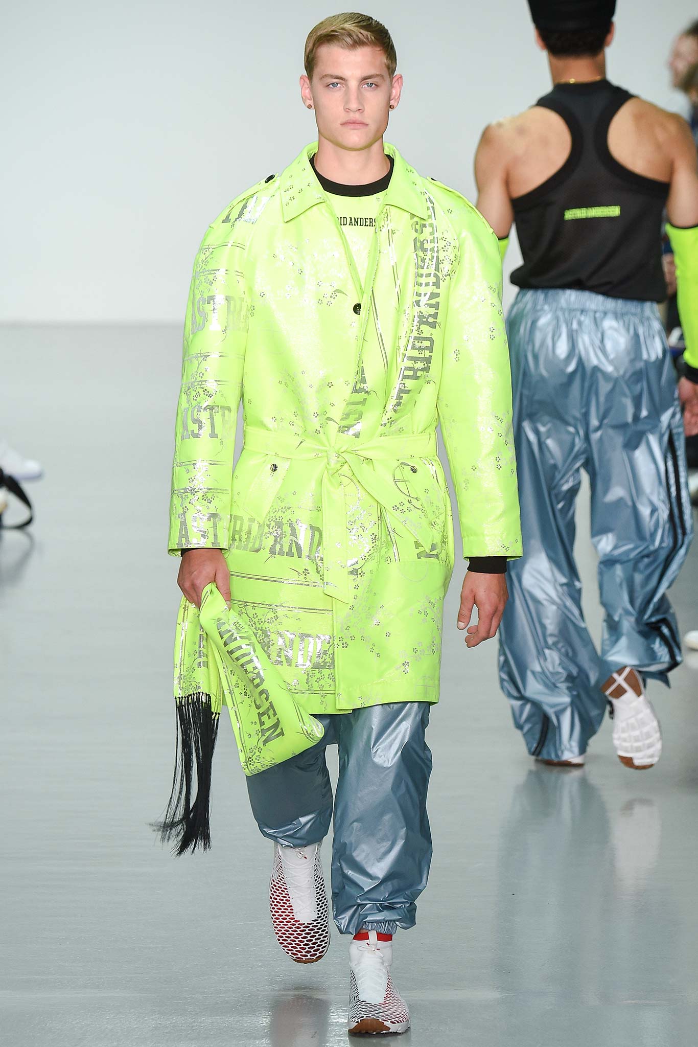 green vinyl long-sleeve collared relaxed zippered buttoned coat