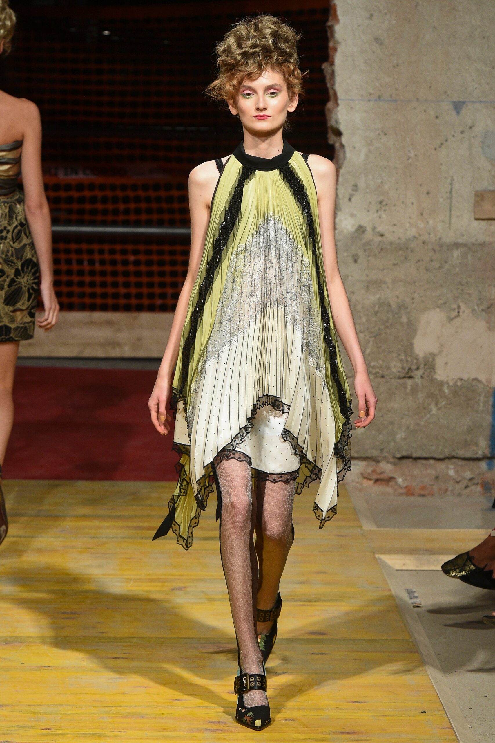 yellow and black draped mini dress