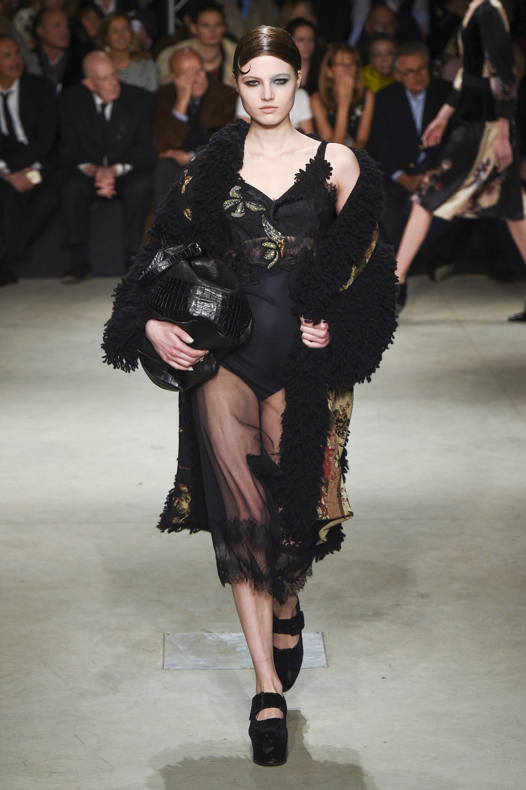 black silk dress with faux-fur coat
