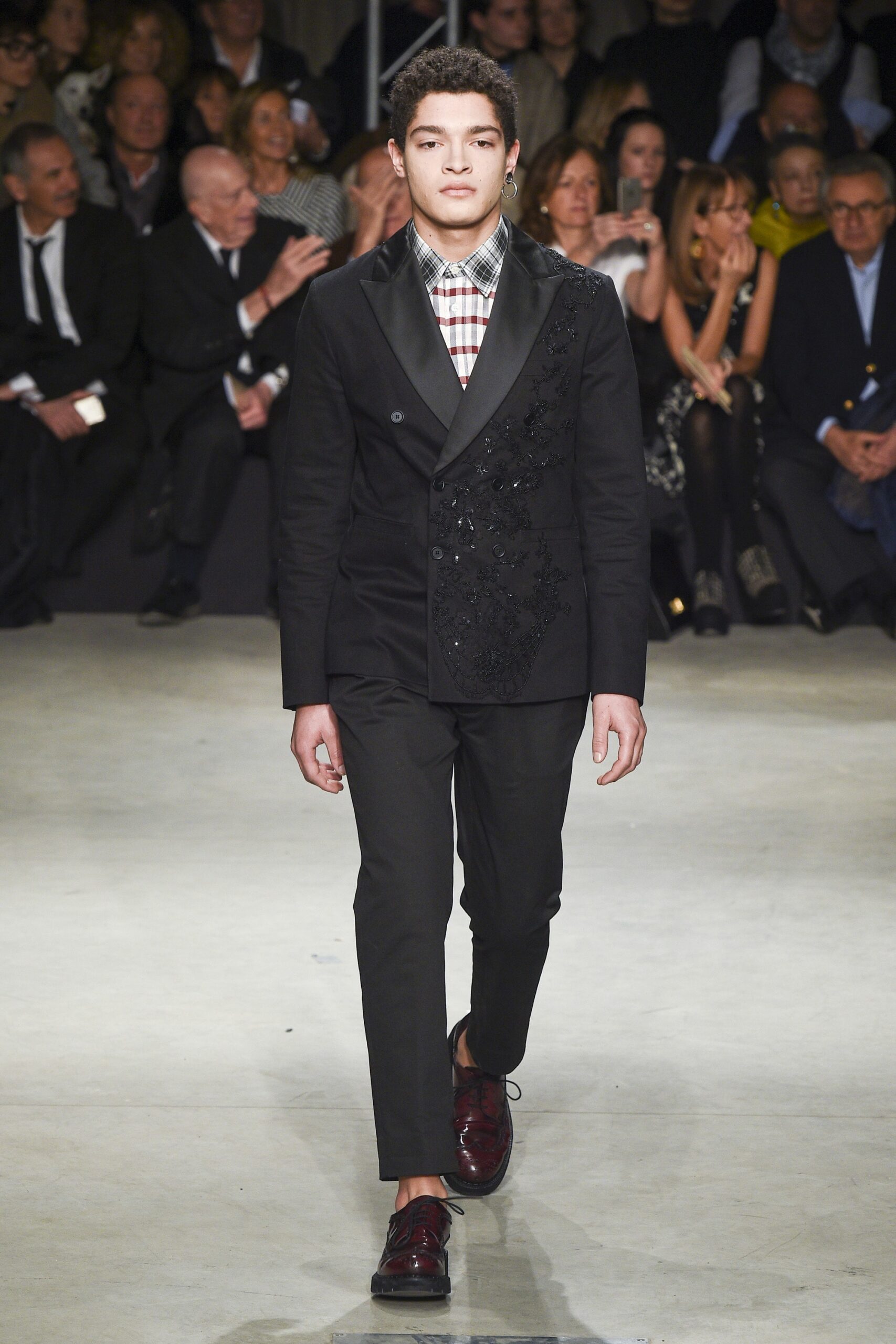 black tailored suit with checked shirt