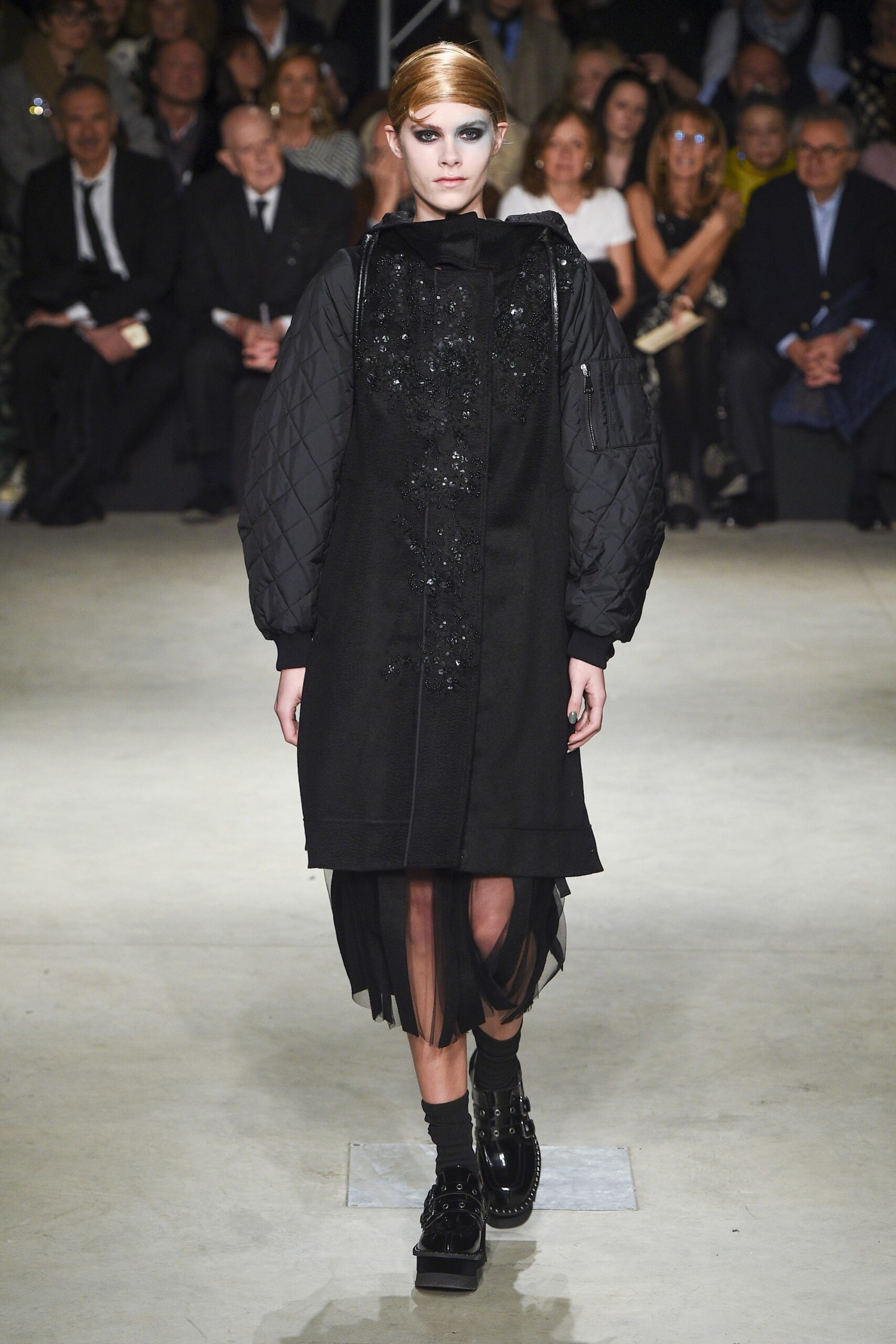 black relaxed coat with tulle skirt
