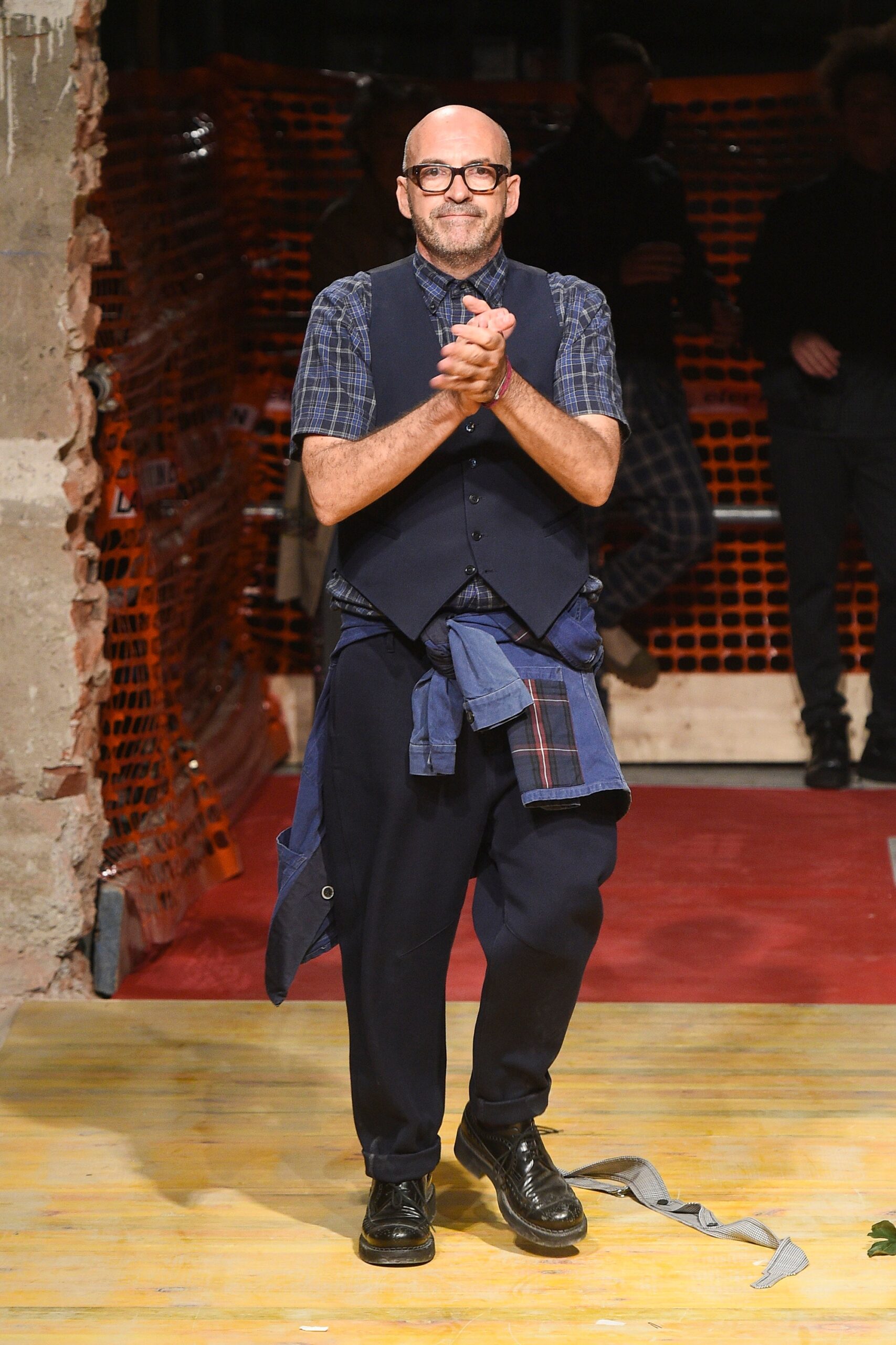 blue cotton vest with plaid shirt