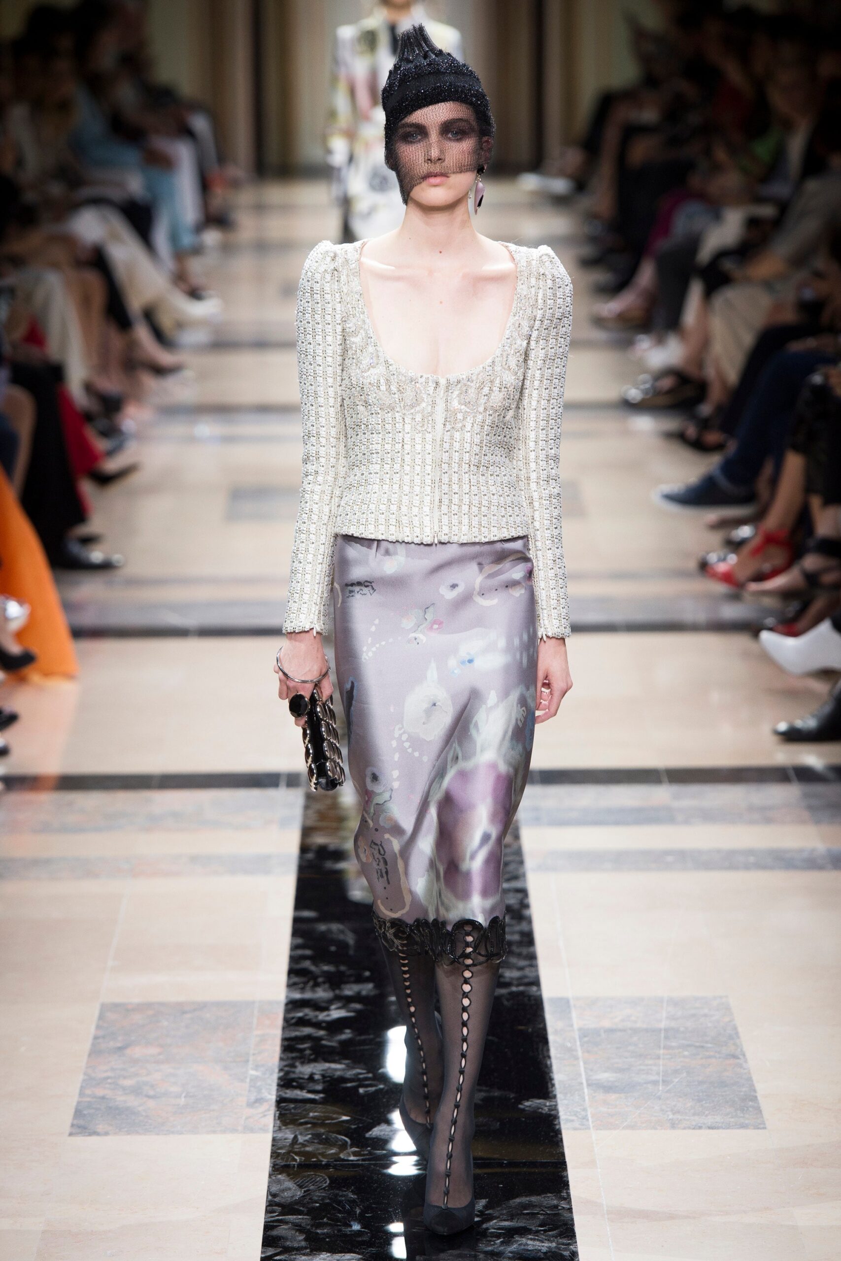 fitted white beaded top and gray pencil skirt