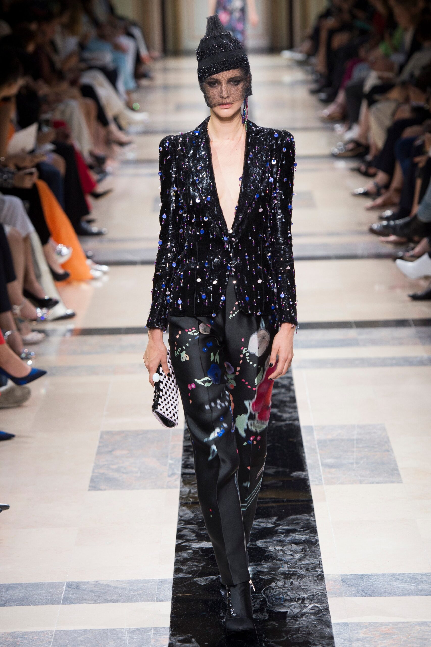 black sequined blazer with printed pants