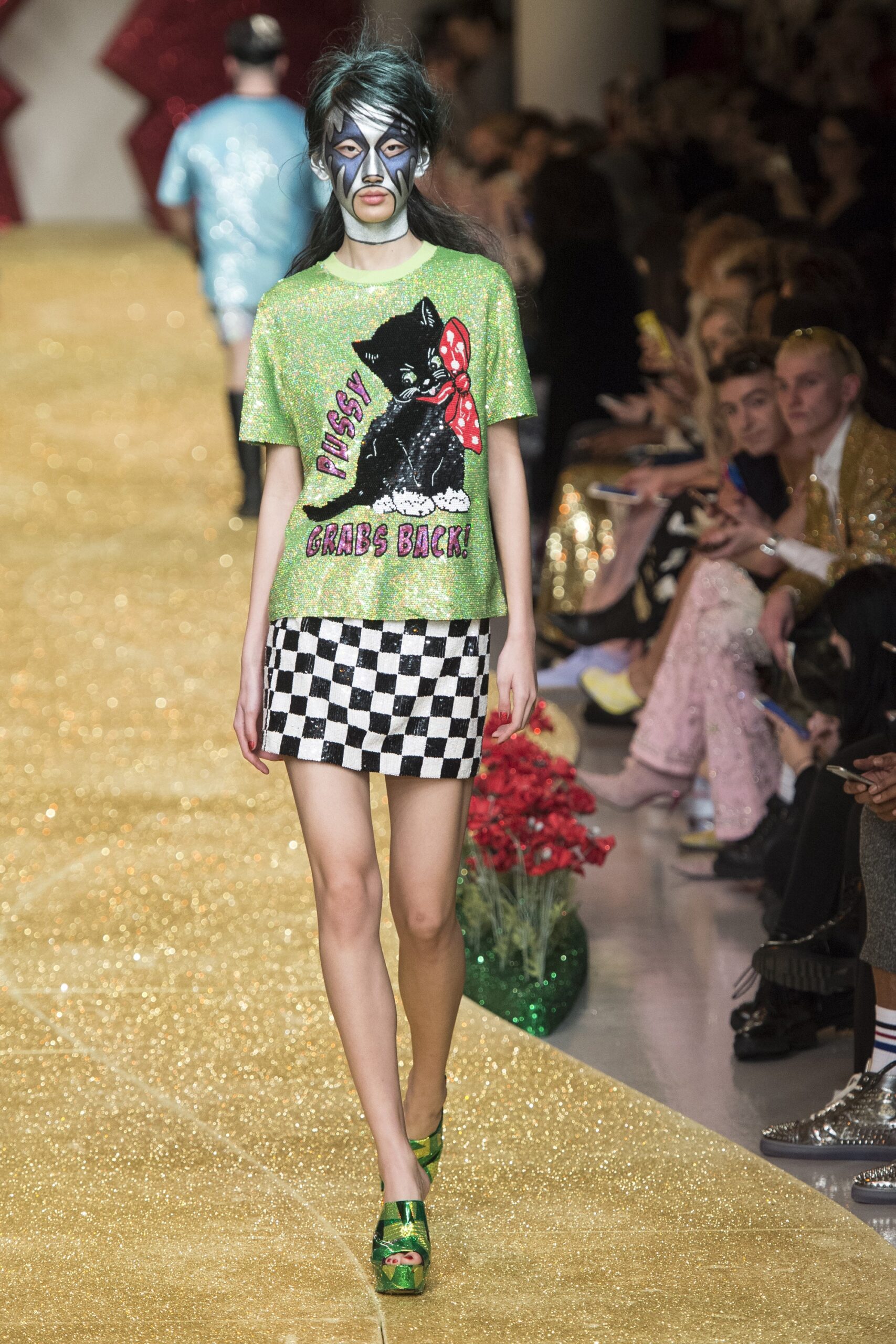 green printed top with checkered skirt