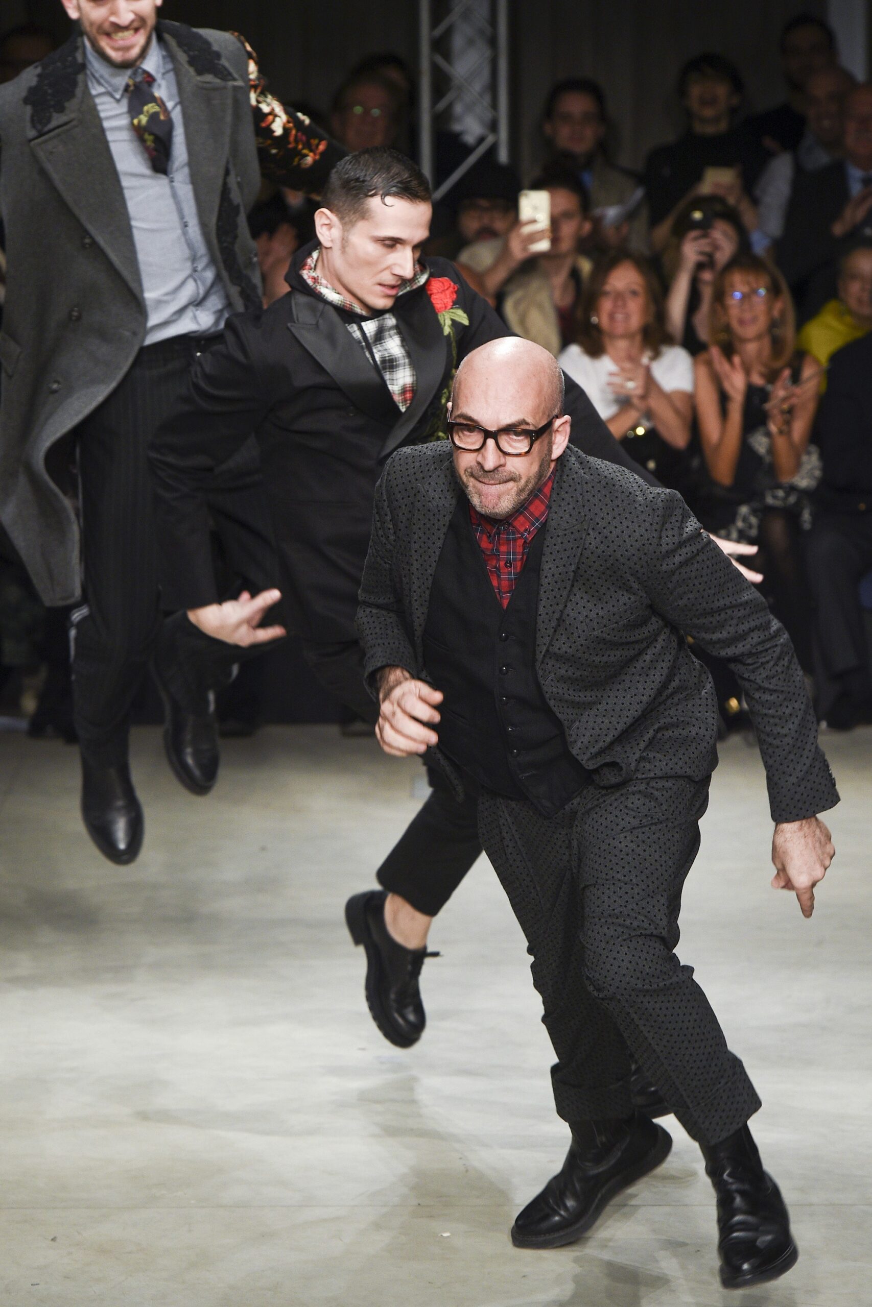 black tailored suit with gray shirt