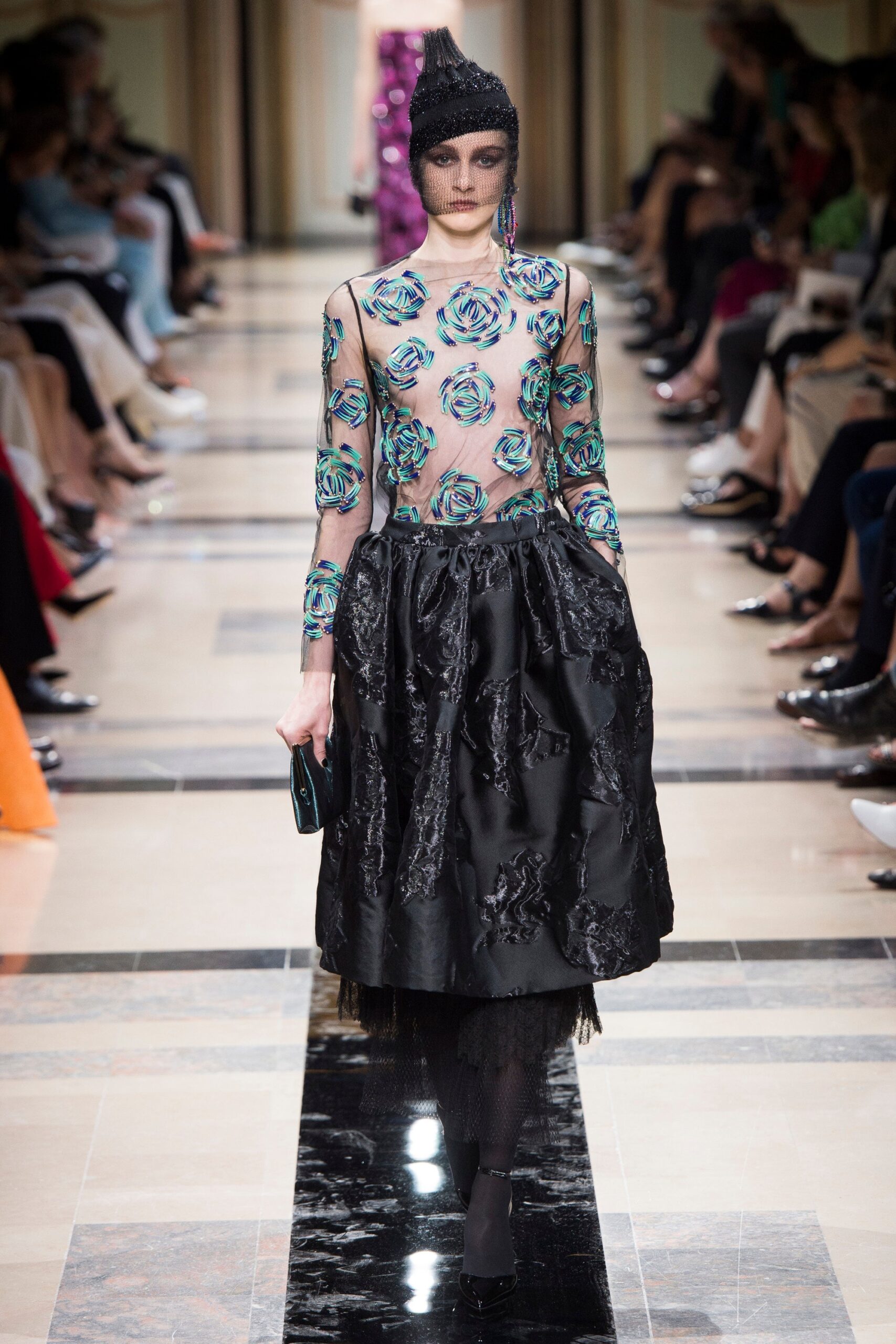 sheer floral top with pleated skirt