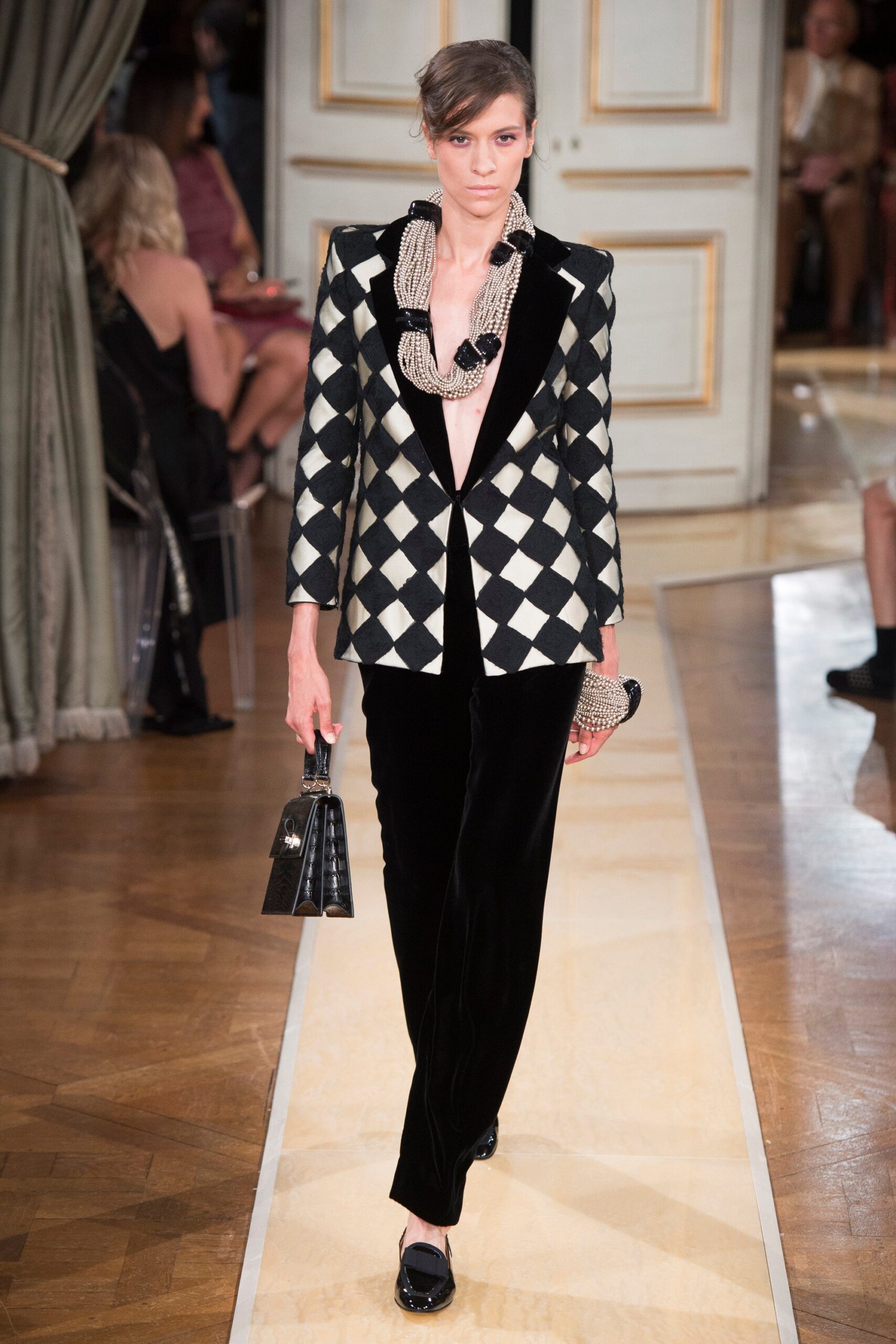 black and white checked blazer with fitted pants