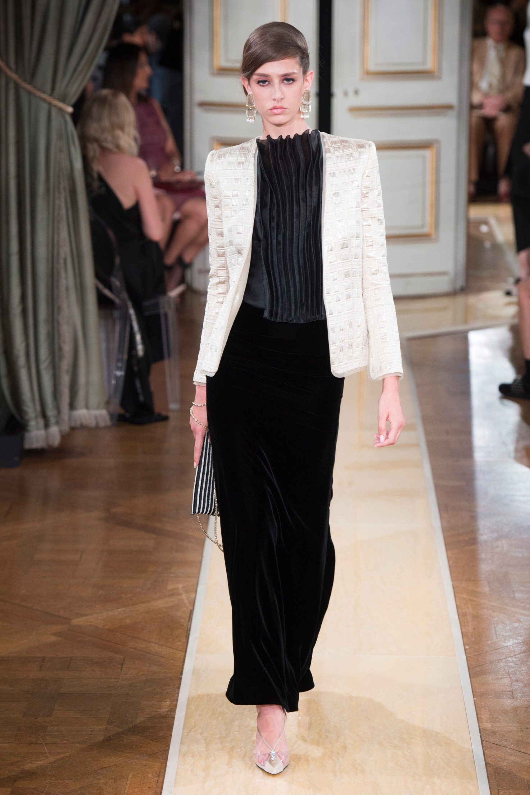 white tailored blazer and black velvet skirt