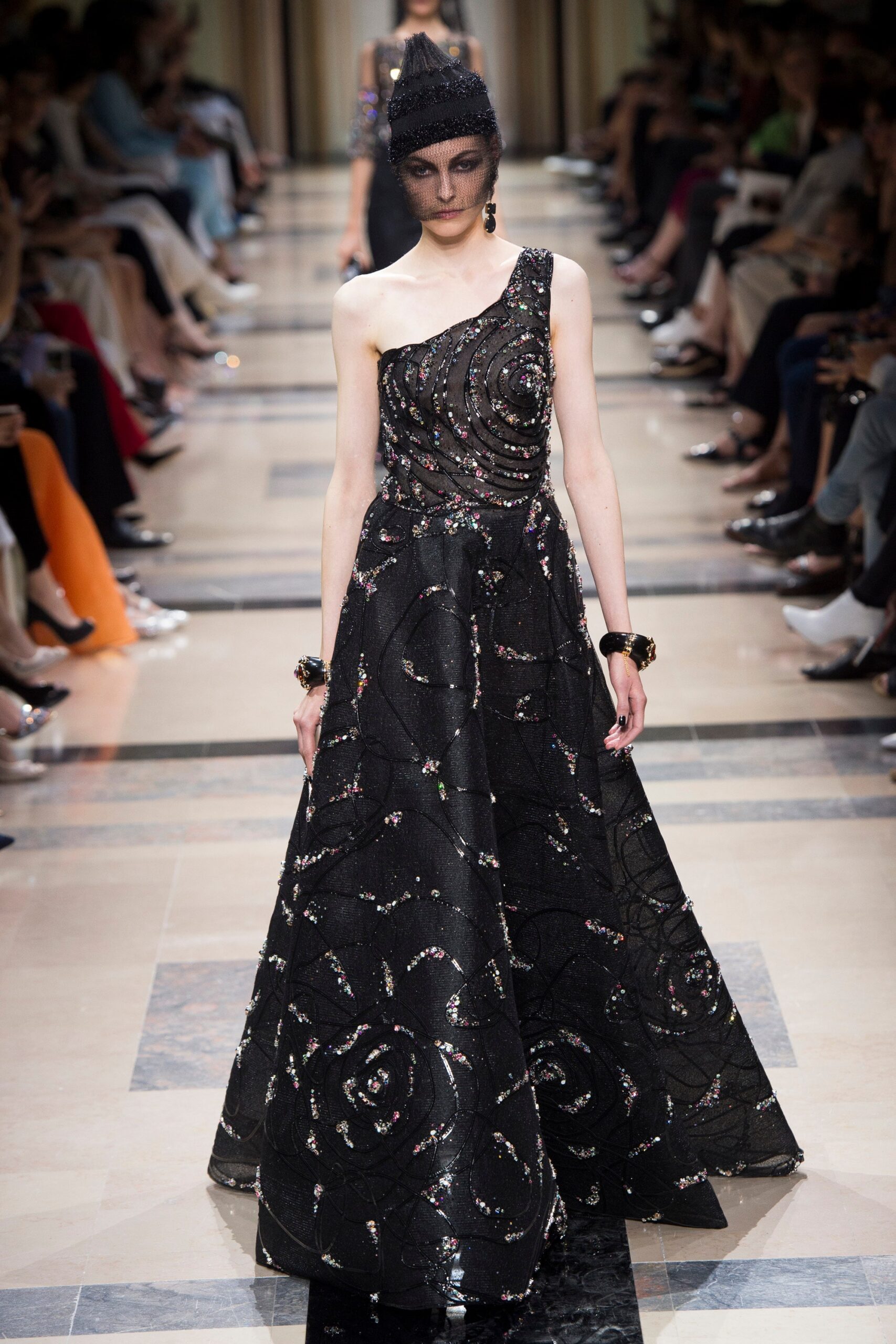 black embroidered sleeveless gown