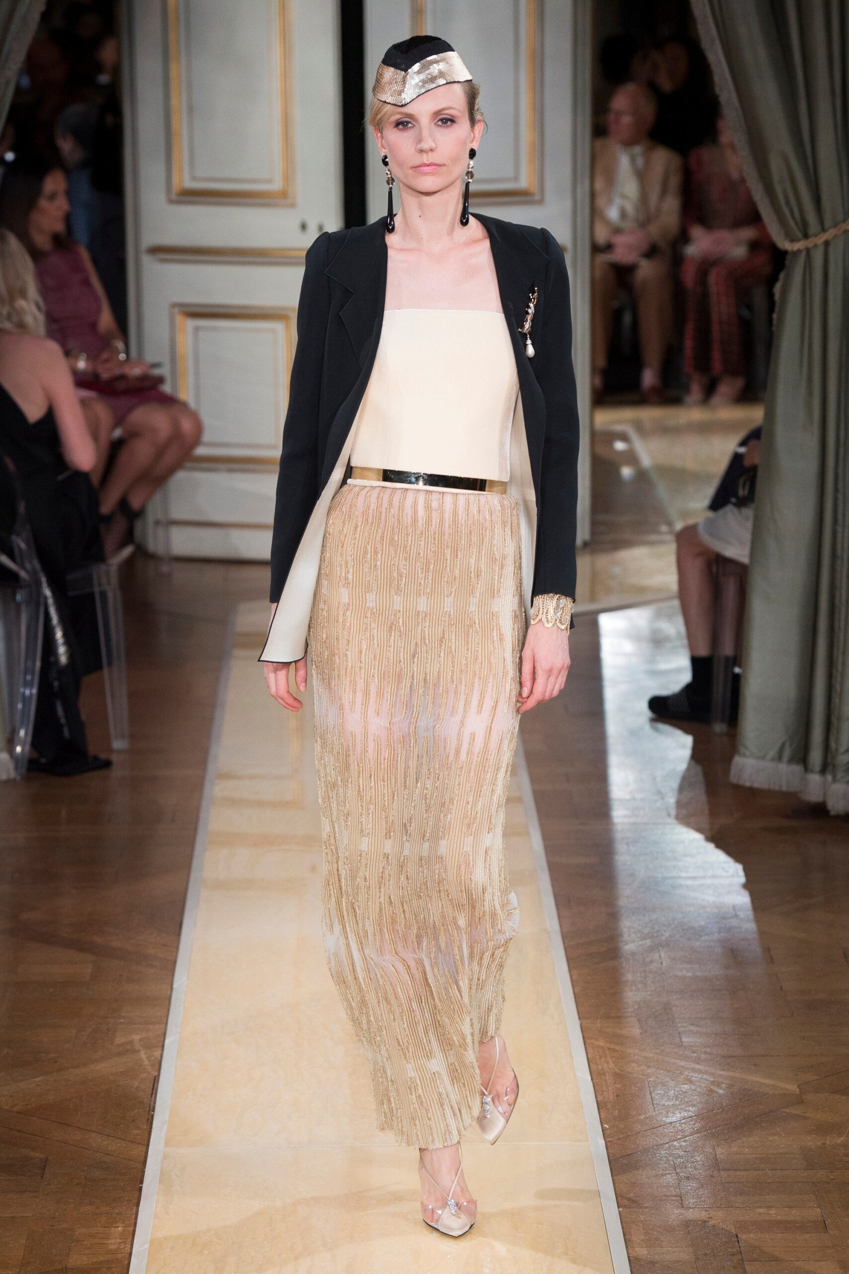 black blazer white top gold pleated skirt