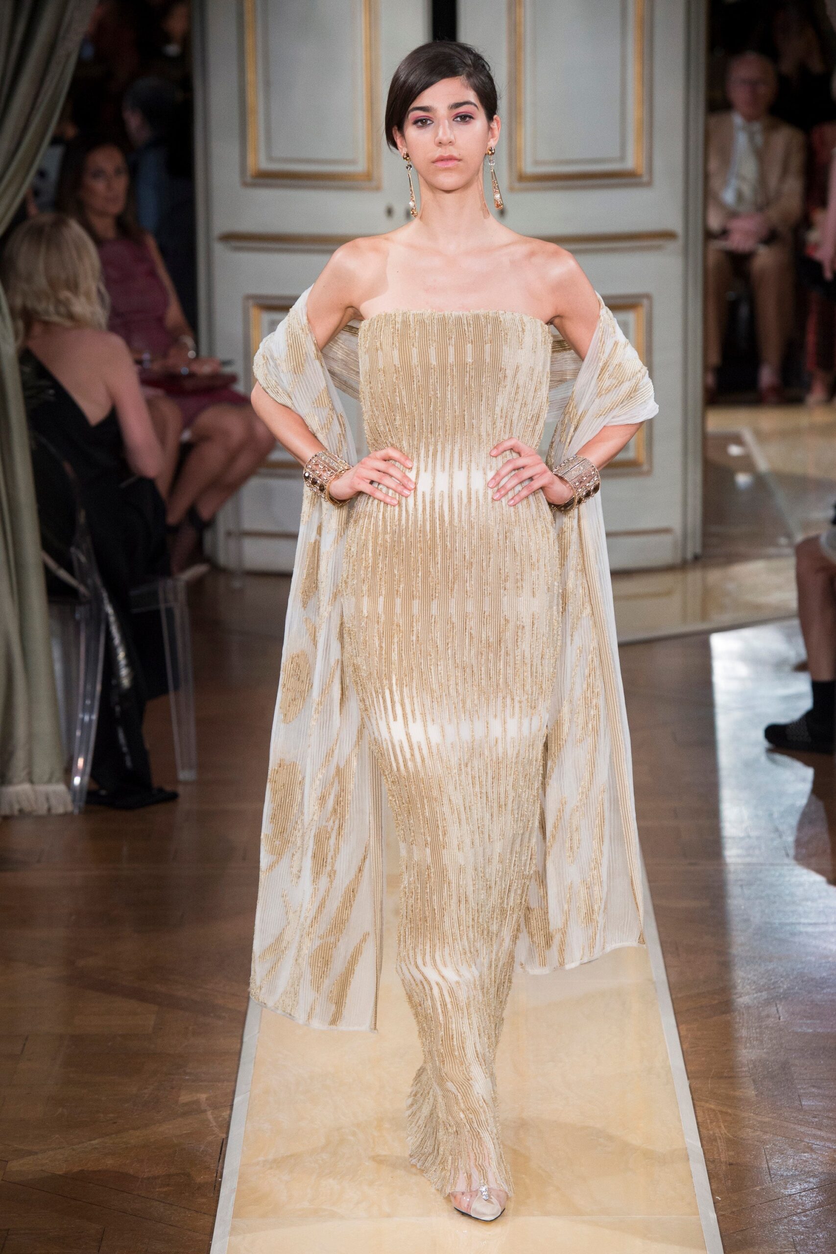 gold sequin strapless gown with cape