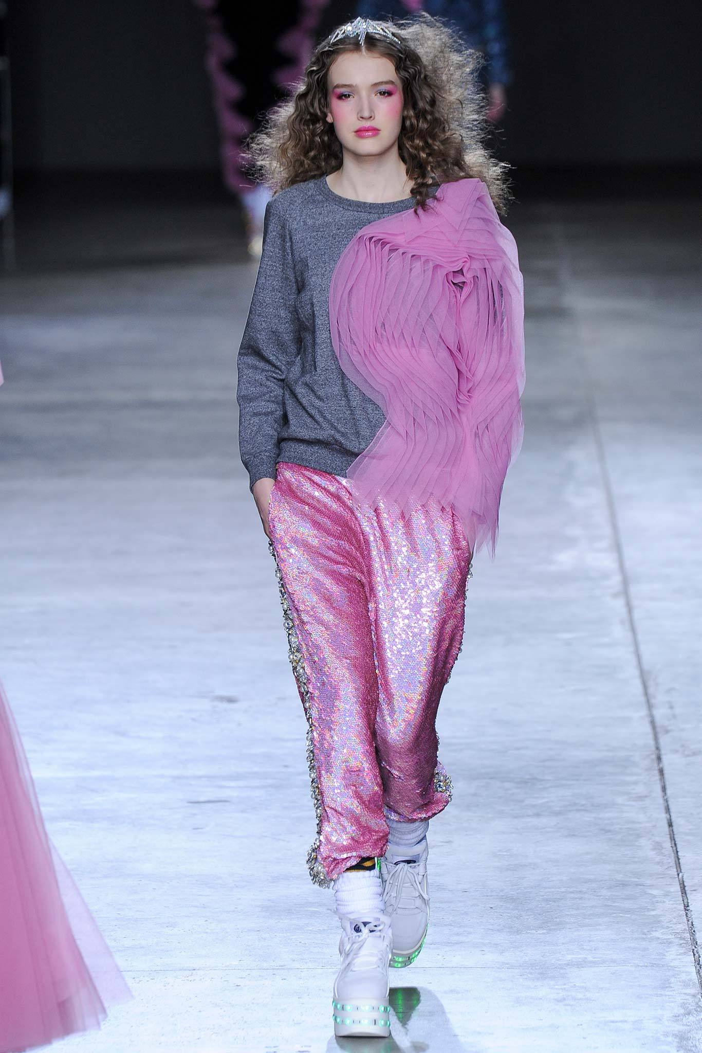 gray sweater with pleated detail and pink sequin pants
