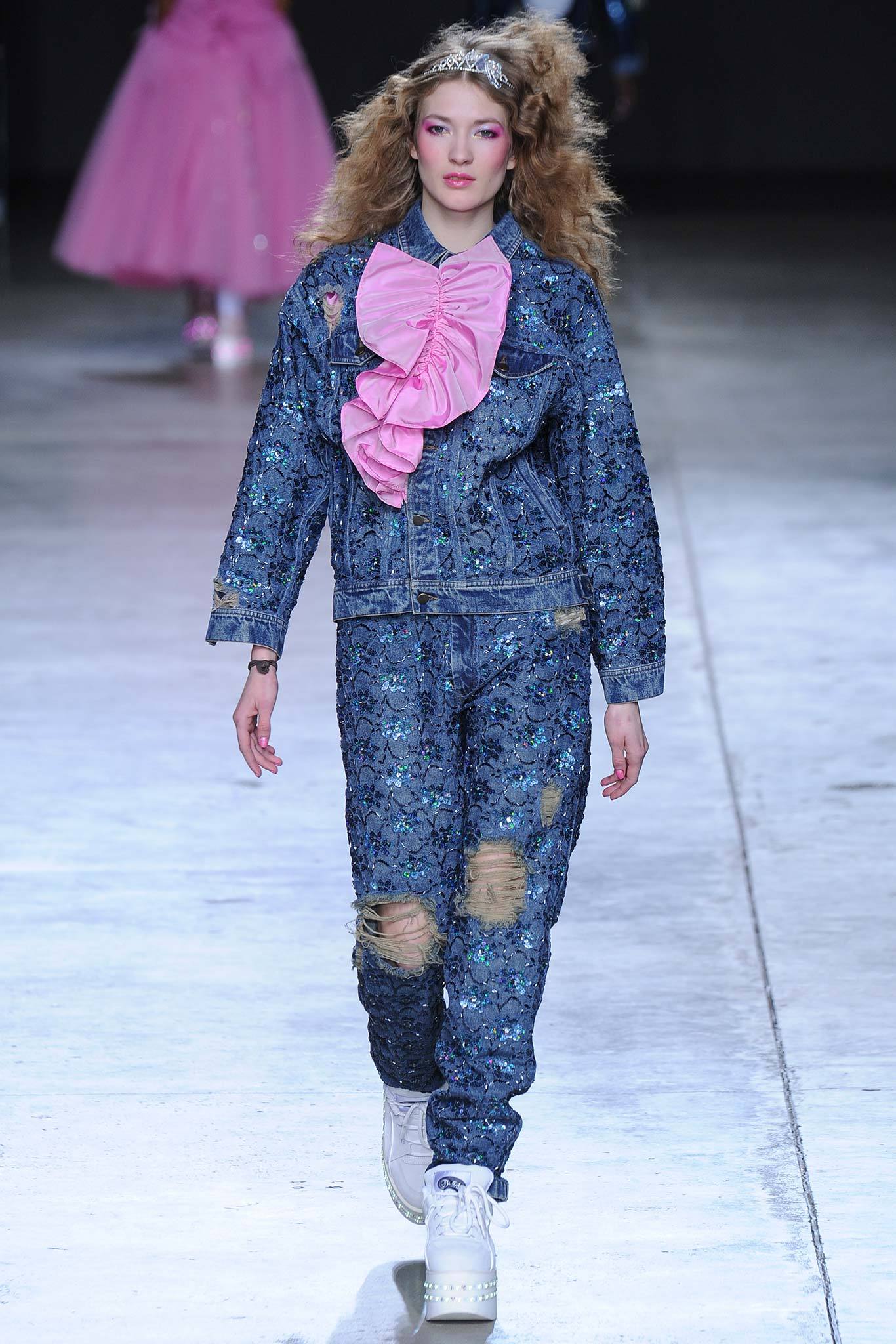 blue denim jacket with pink ruffled top