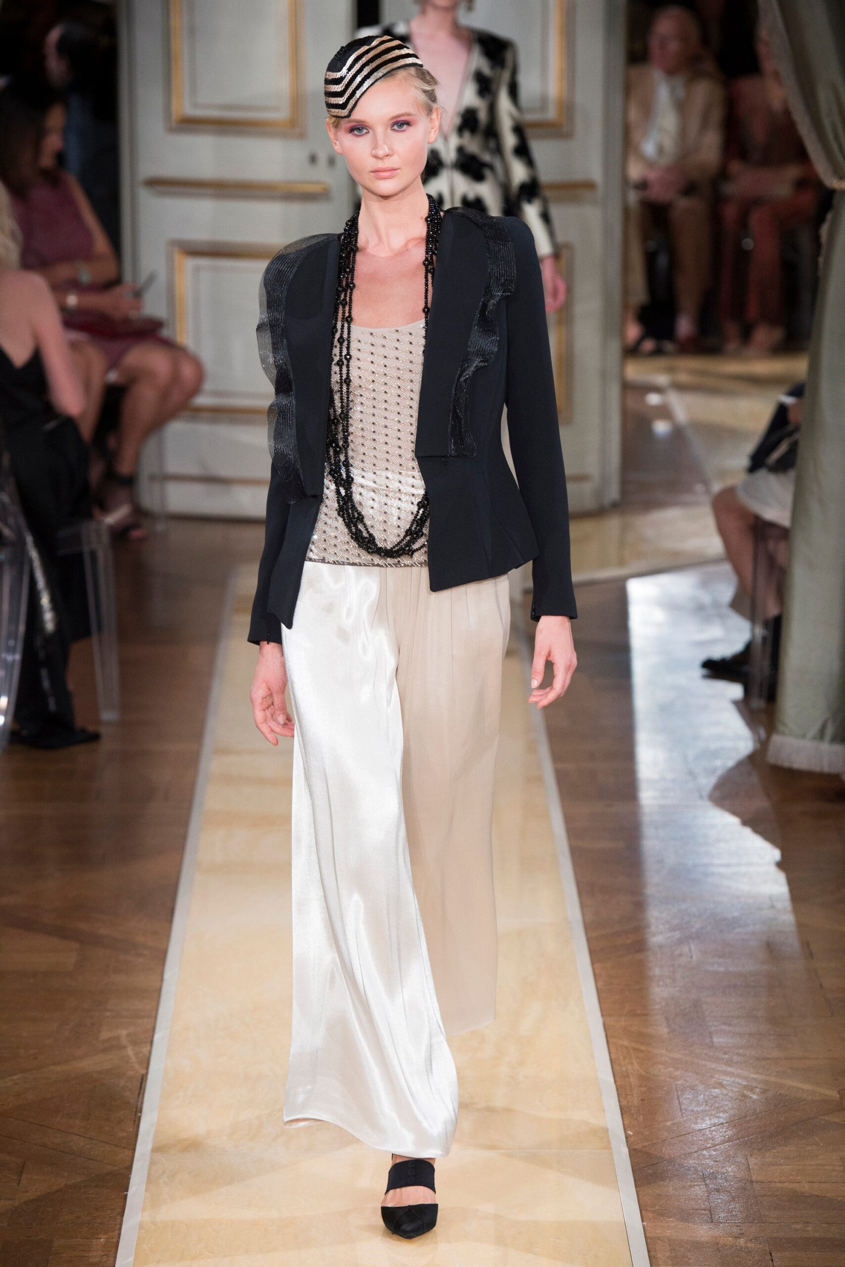 black tailored blazer with beige top