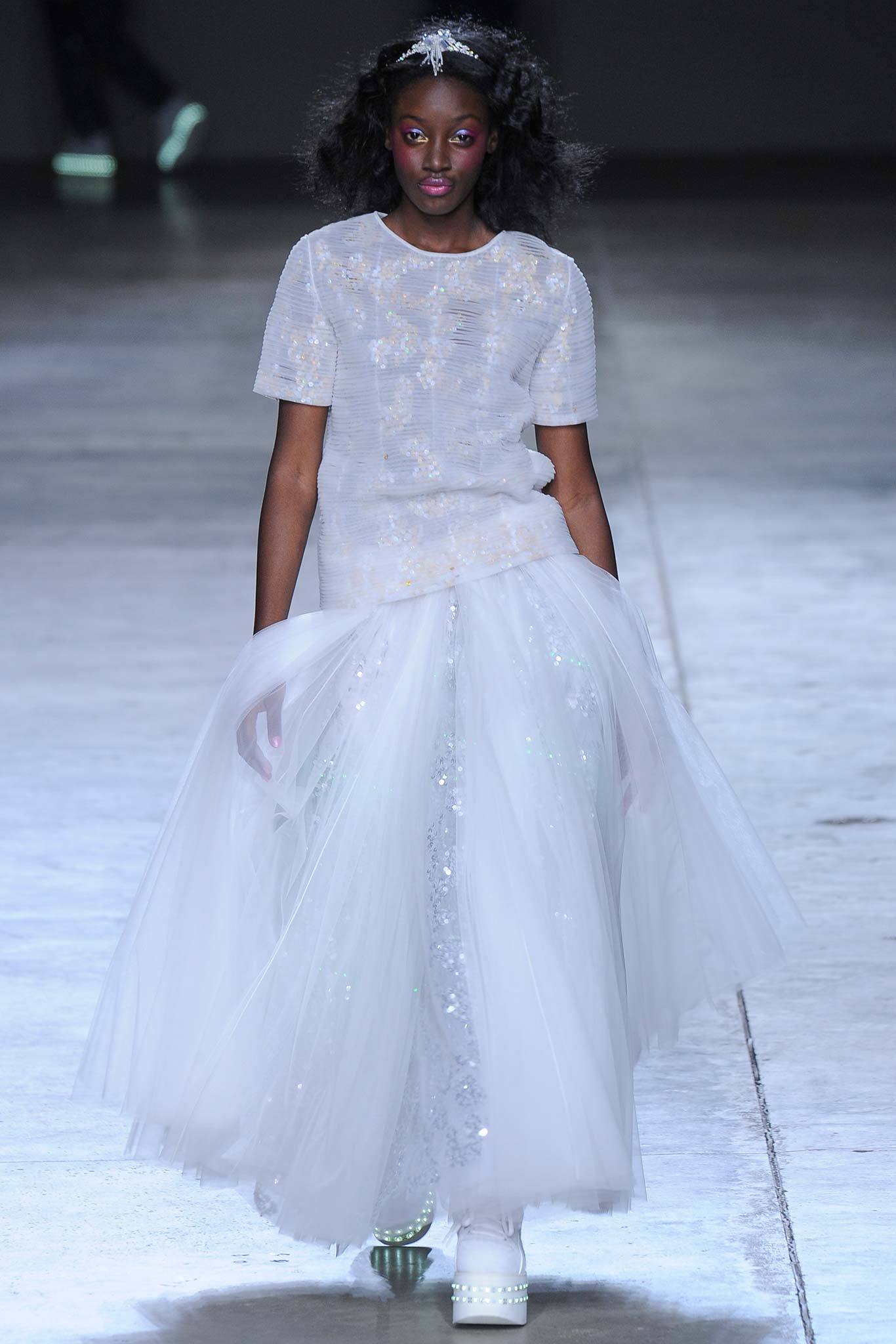 white embroidered top with layered skirt