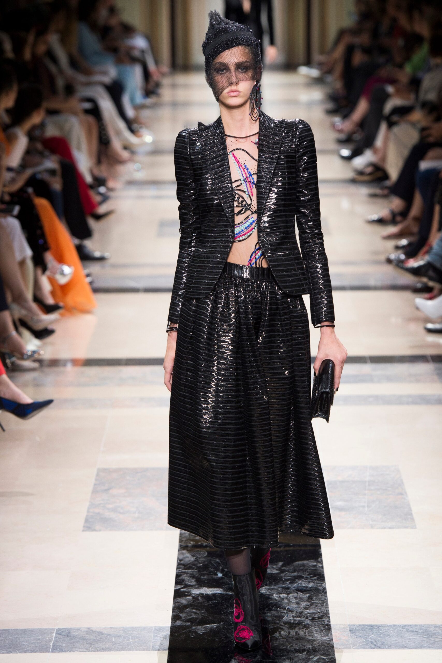 black silk blazer and pleated skirt