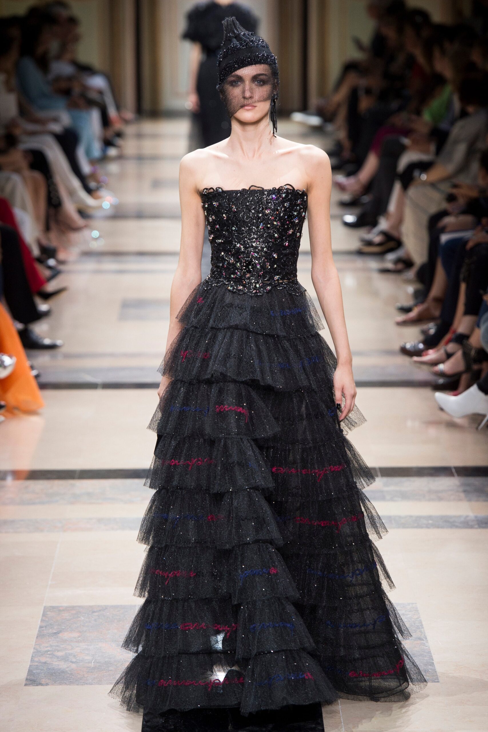 black tiered strapless gown