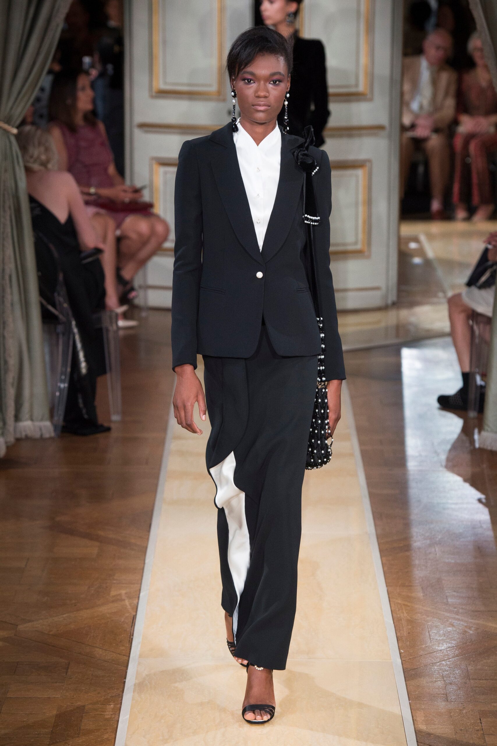 black tailored suit with asymmetric dress