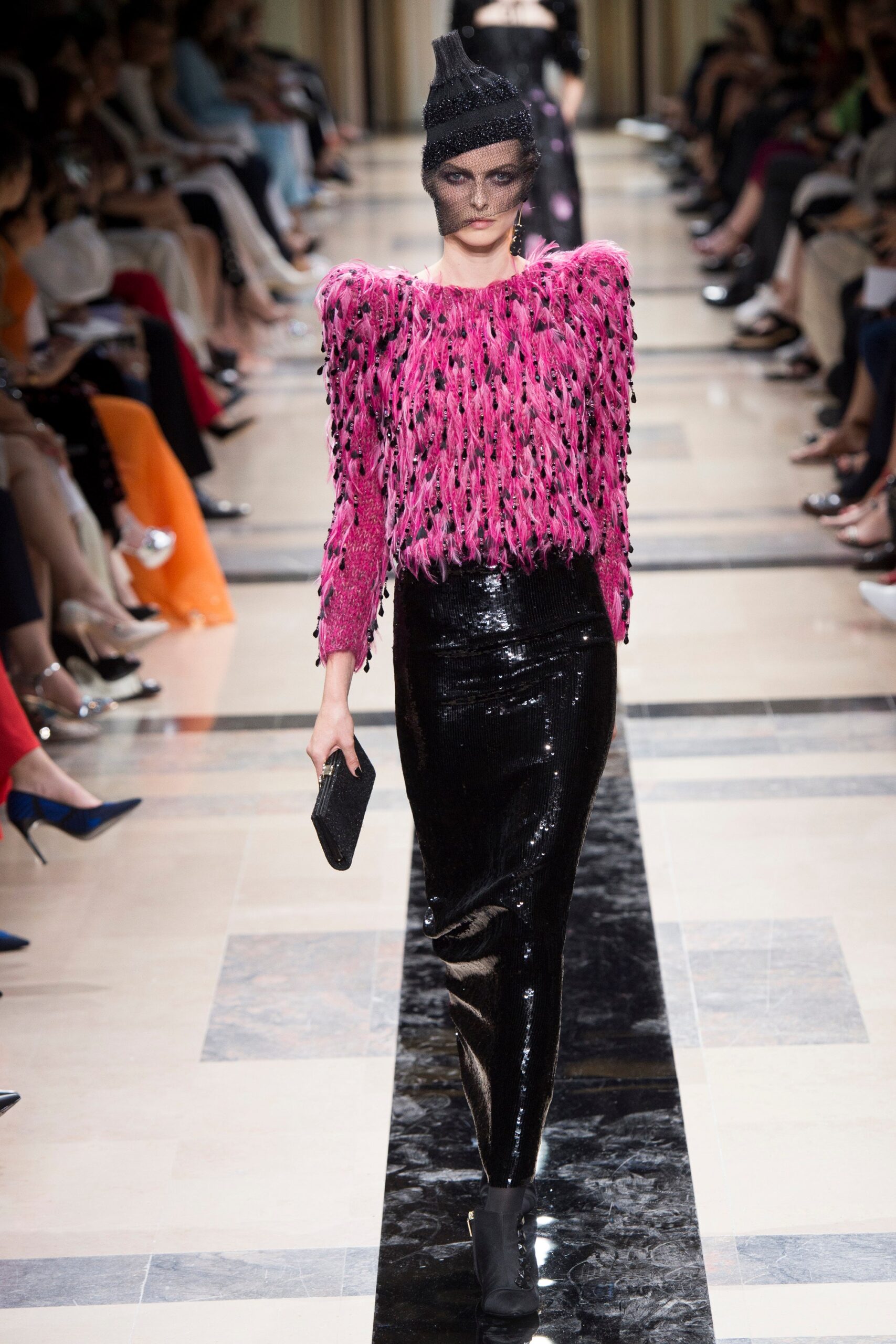 pink fringed top and black sequin skirt