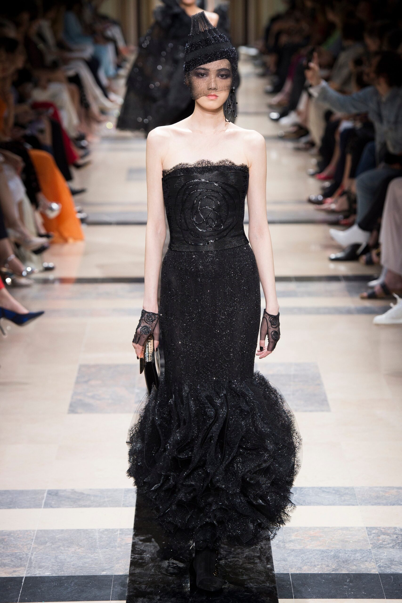 black strapless ruffled gown