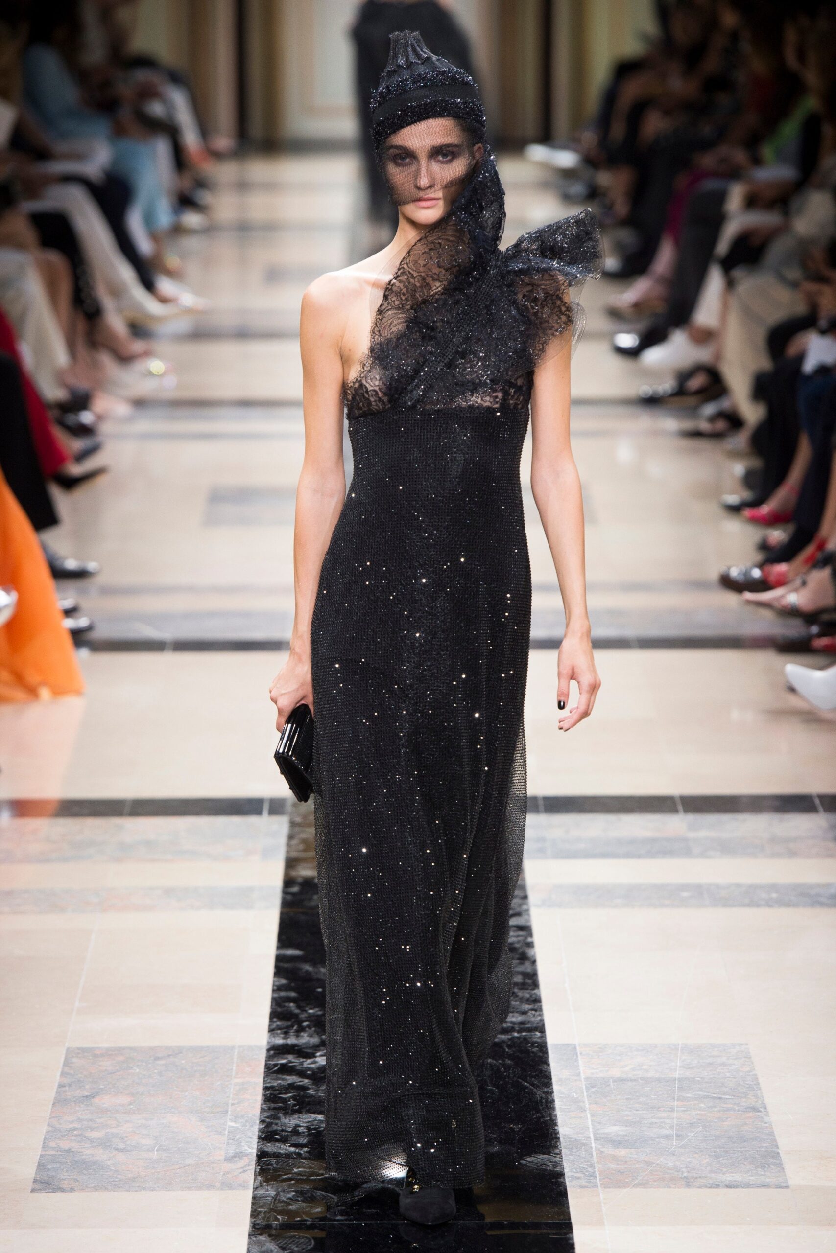 black sequined gown with lace hat