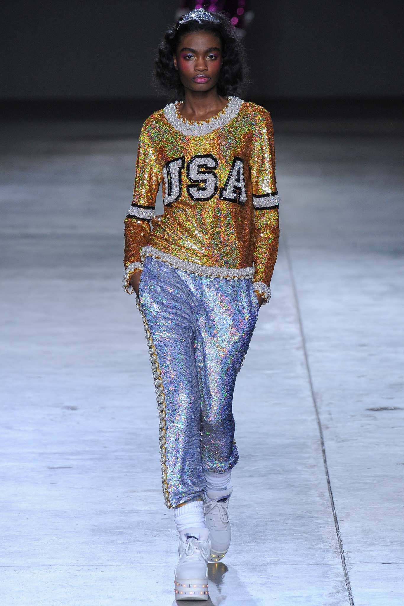 gold sequined top with silver pants