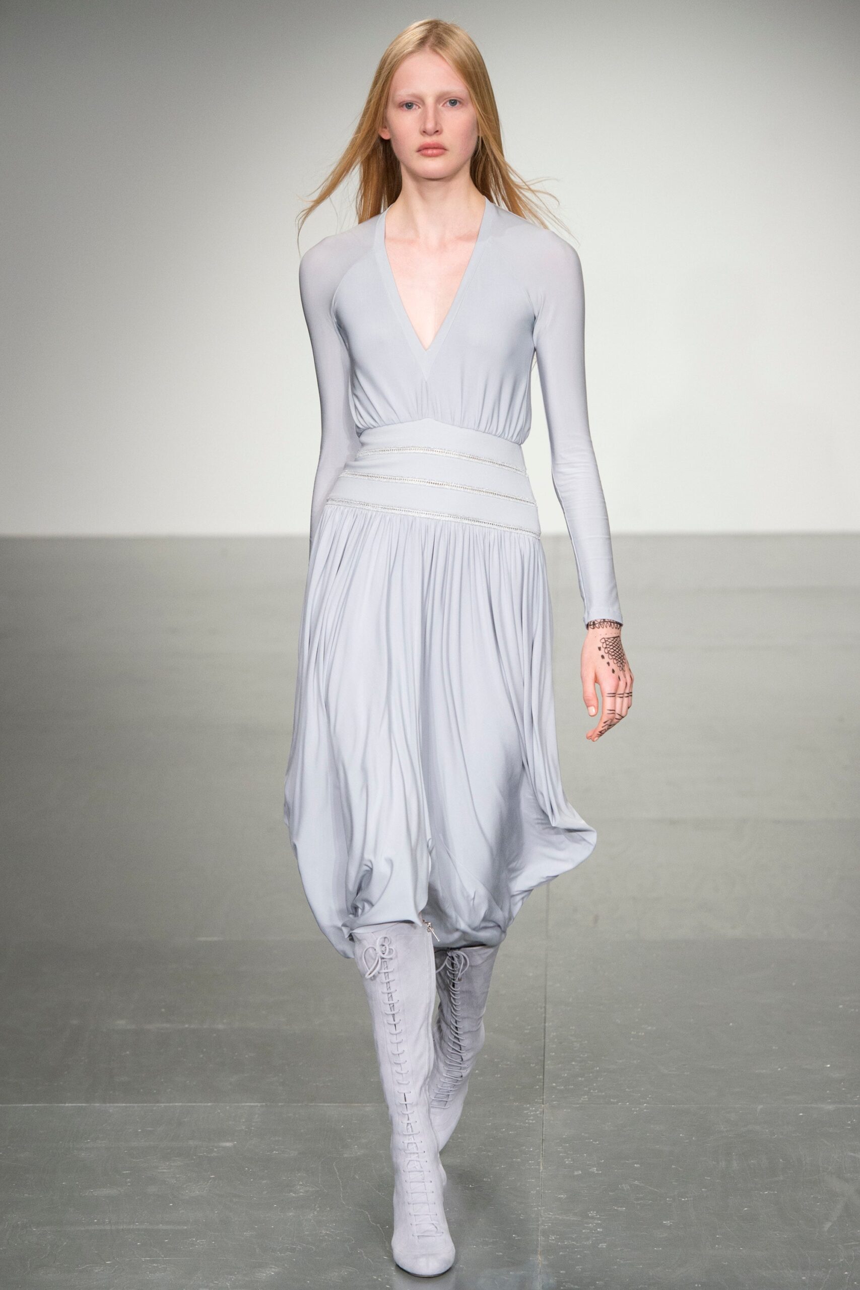 gray silk long-sleeve dress with boots