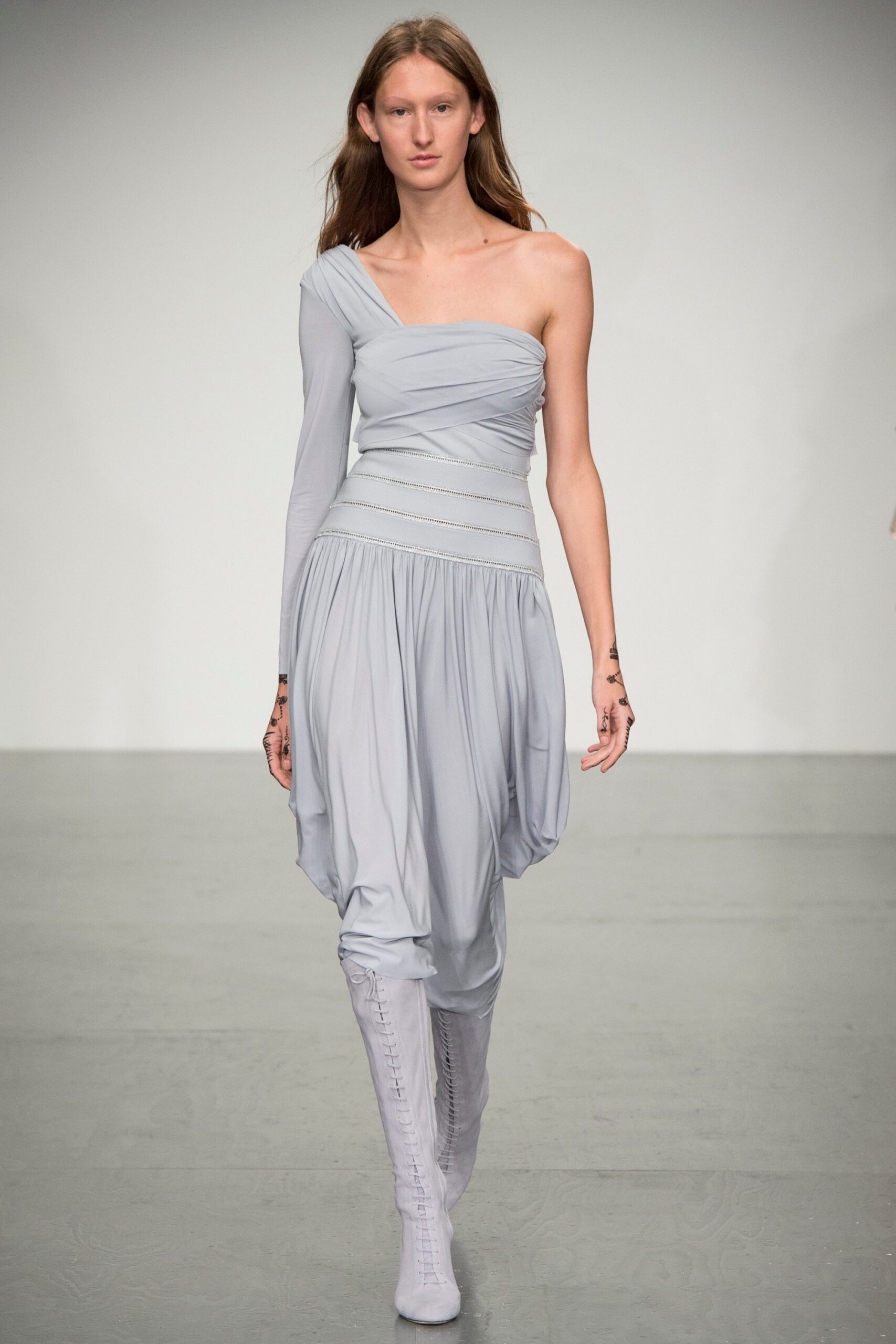 gray draped midi dress with white boots
