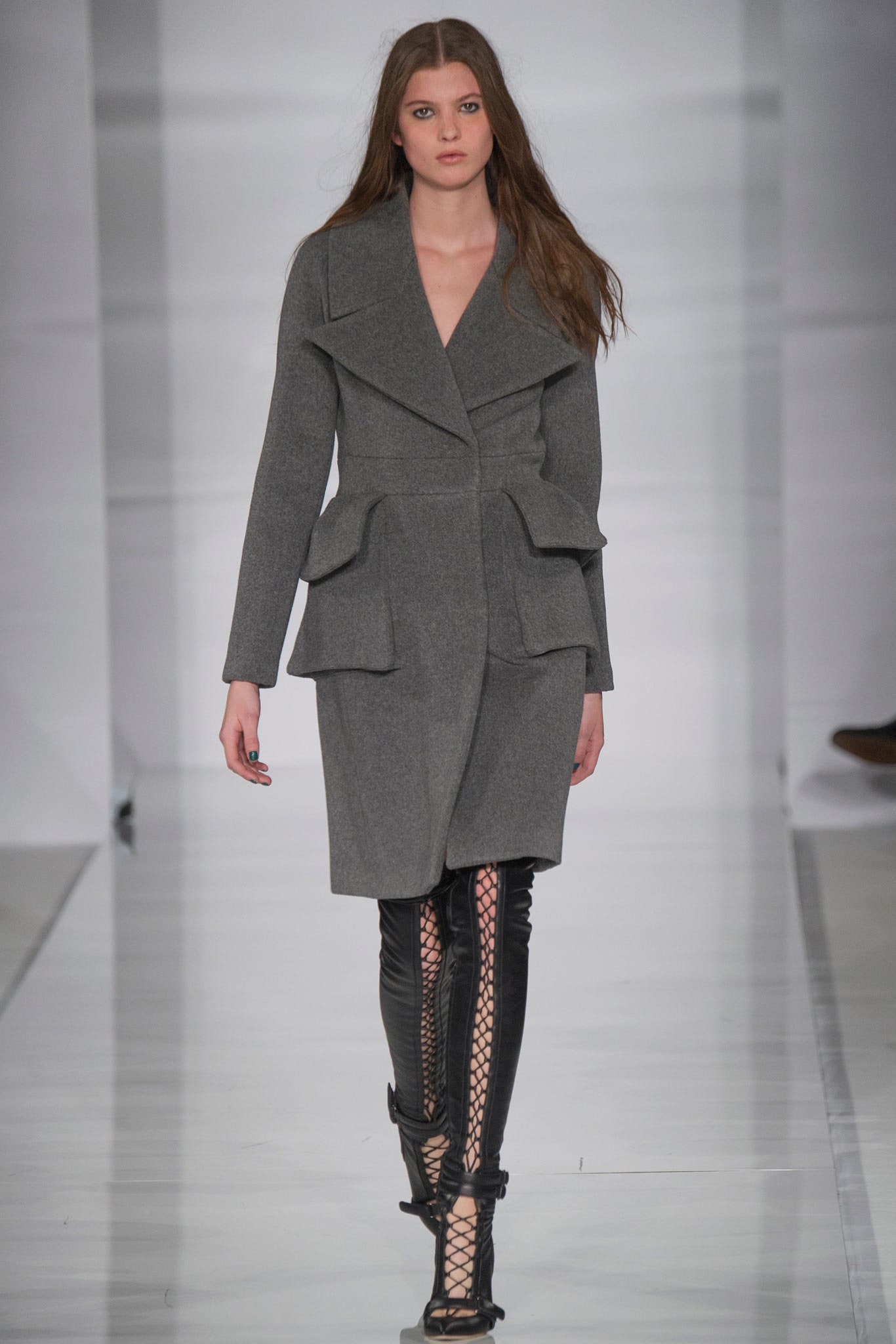 gray wool coat with black leather pants