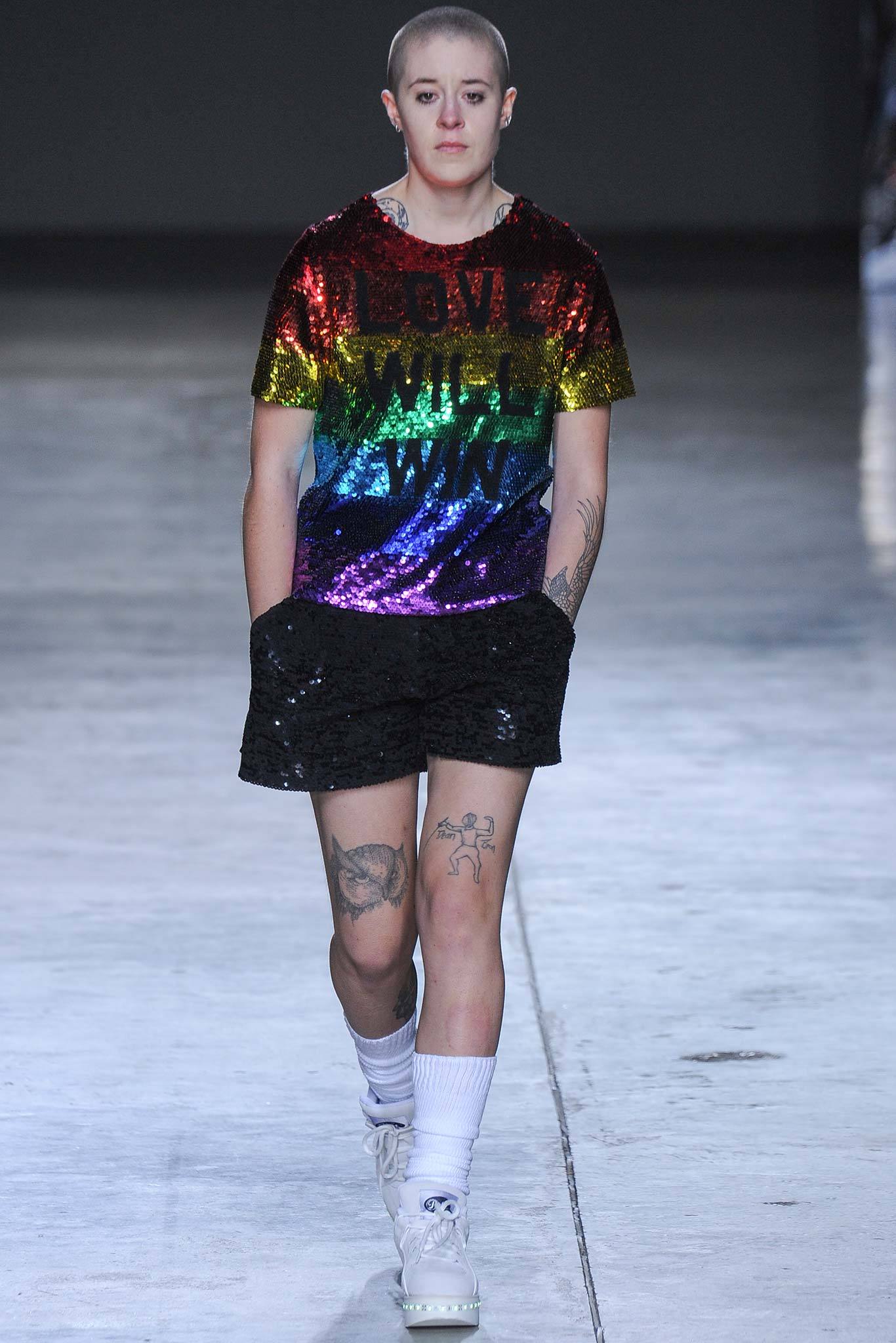 multi-colored sequin t-shirt and black shorts