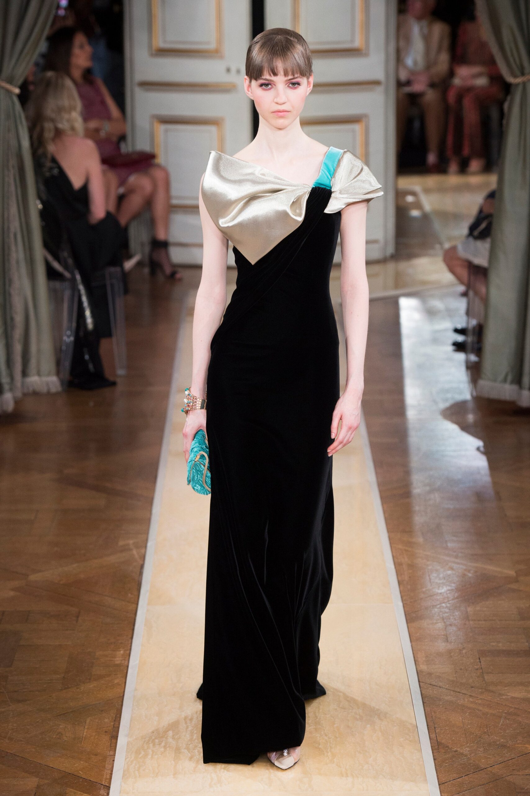 black and gold off-shoulder gown