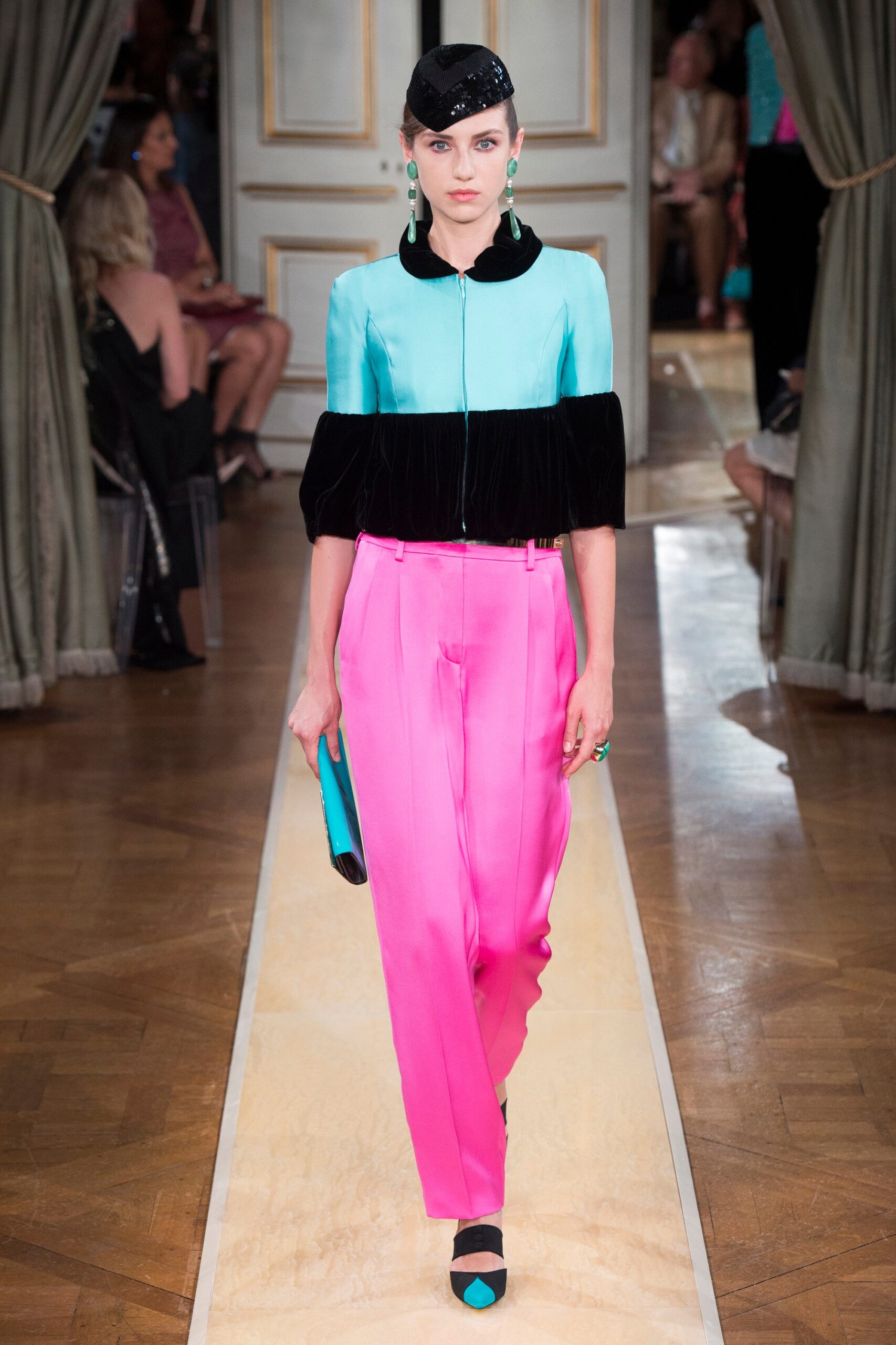 blue and black color-blocked blouse with pink tailored pants